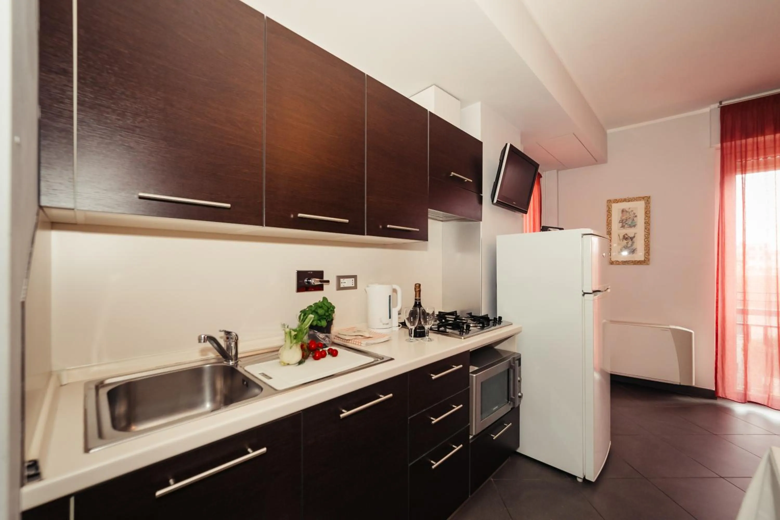 Kitchen or kitchenette in Residence Greco