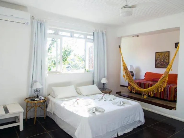 Photo of the whole room, Bed in Pousada Hotel Praia dos Anjos