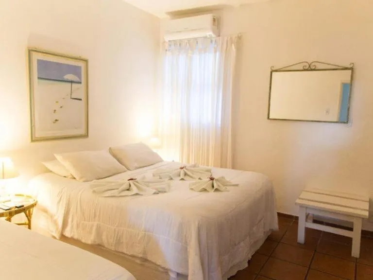 Bed in Pousada Hotel Praia dos Anjos