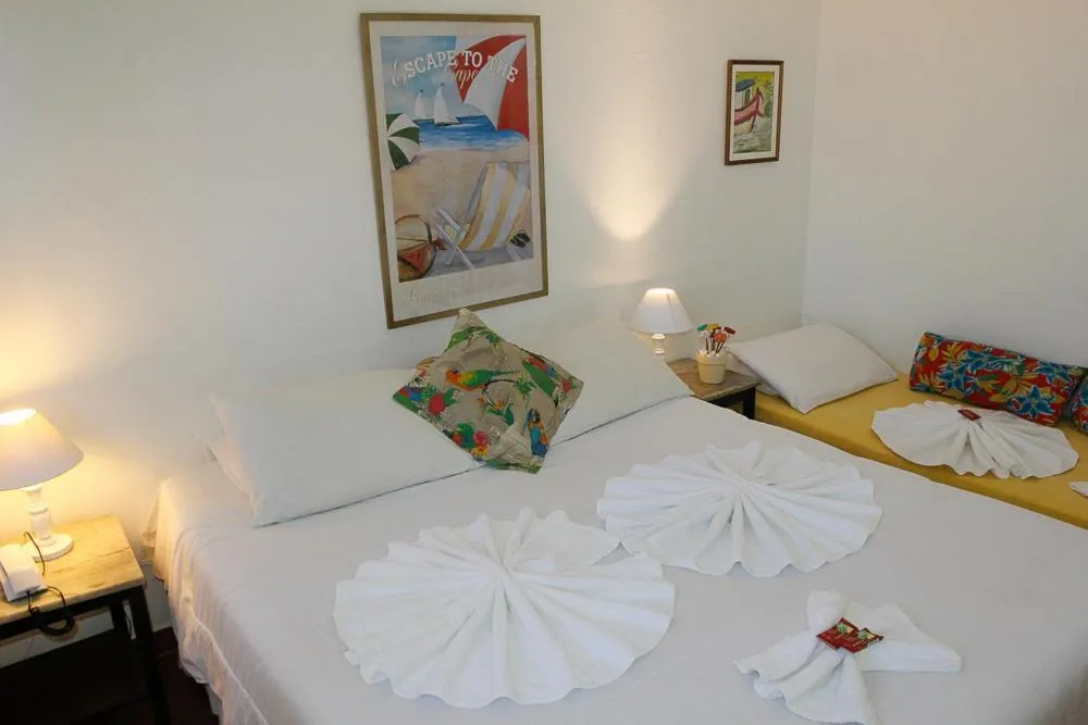 Bed in Pousada Hotel Praia dos Anjos