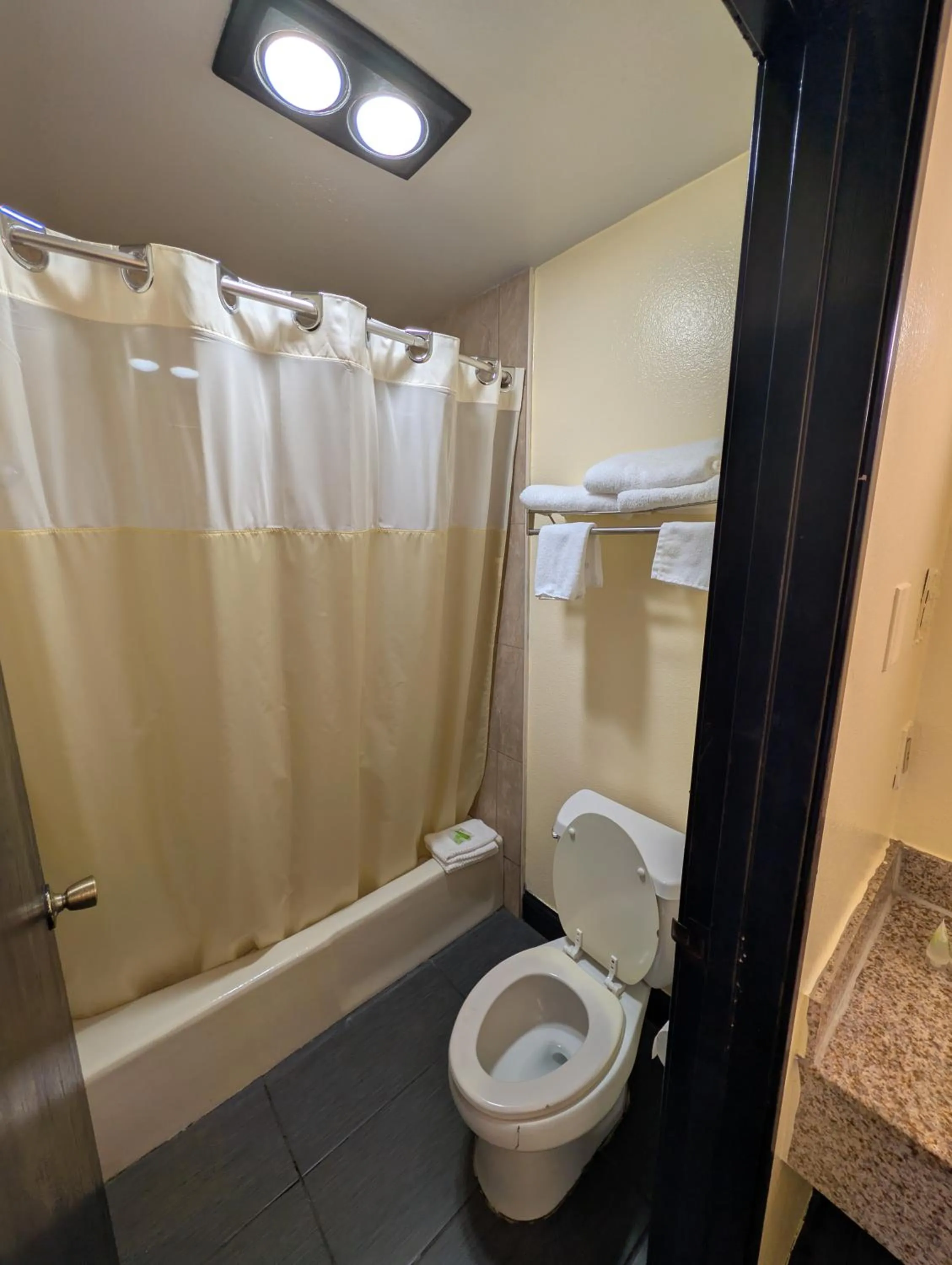 Bathroom in Crossroads Inn - Downtown Sacramento