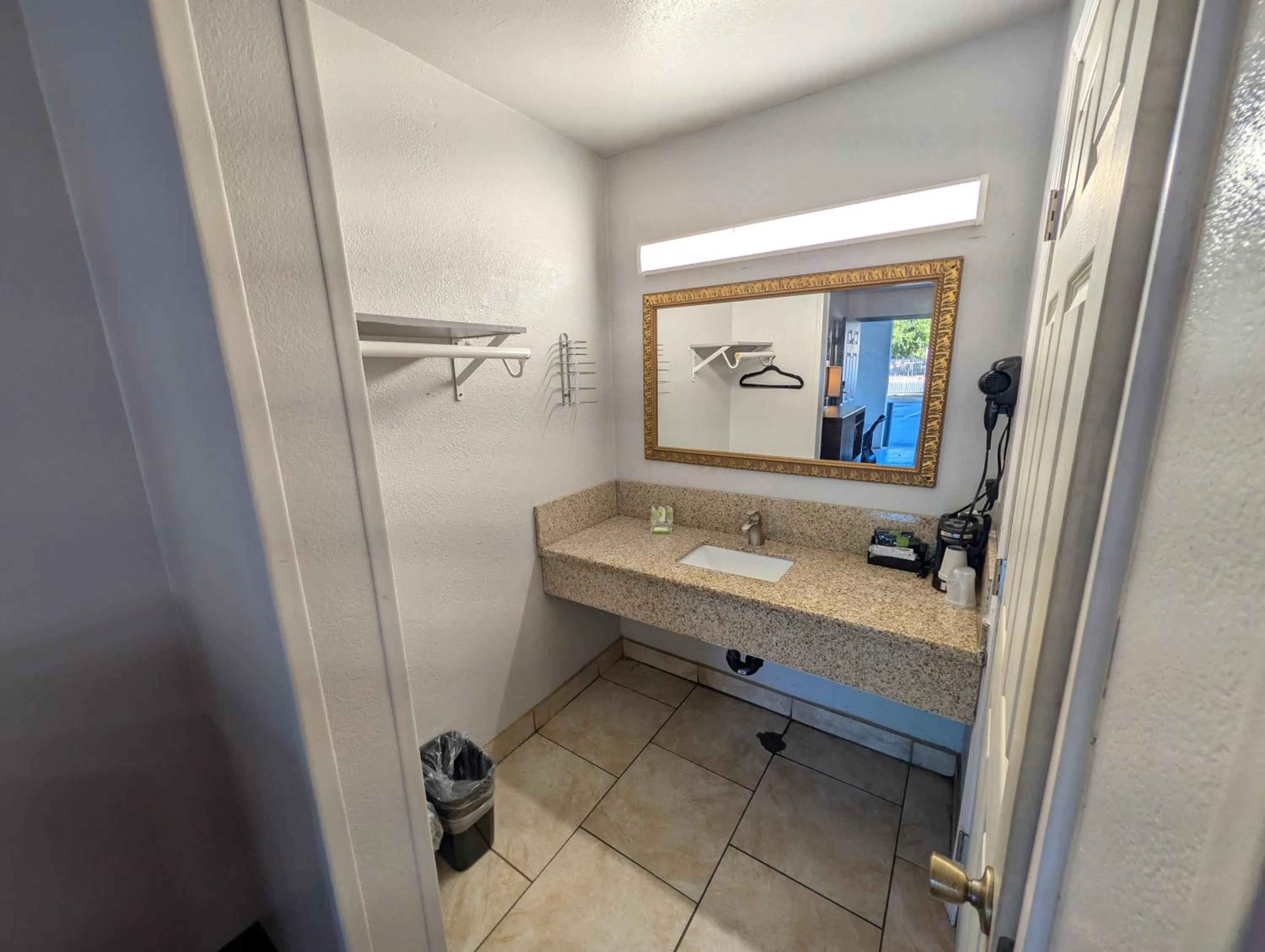 Bathroom in Crossroads Inn - Downtown Sacramento