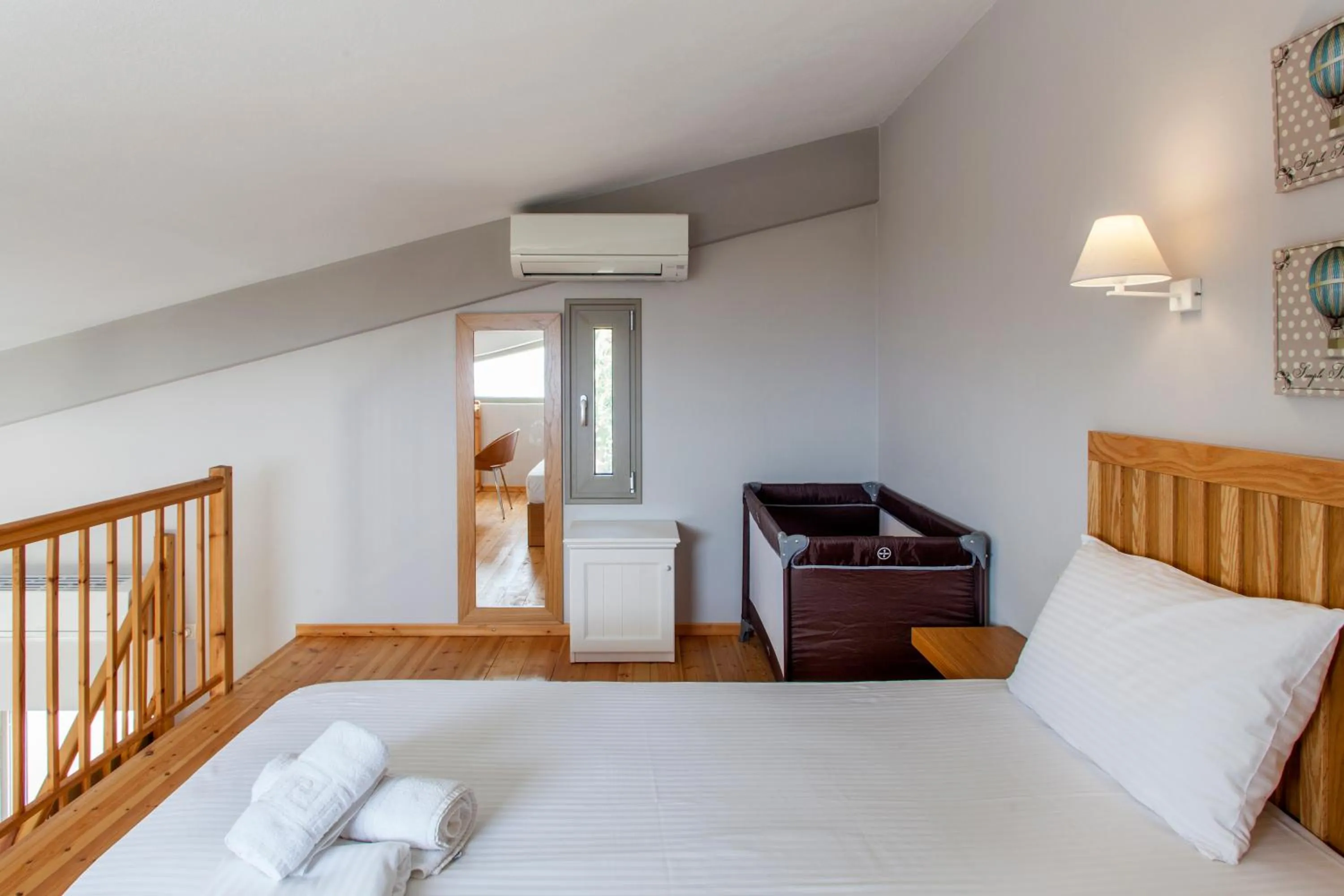 Bed in Mythos Suites Diskos