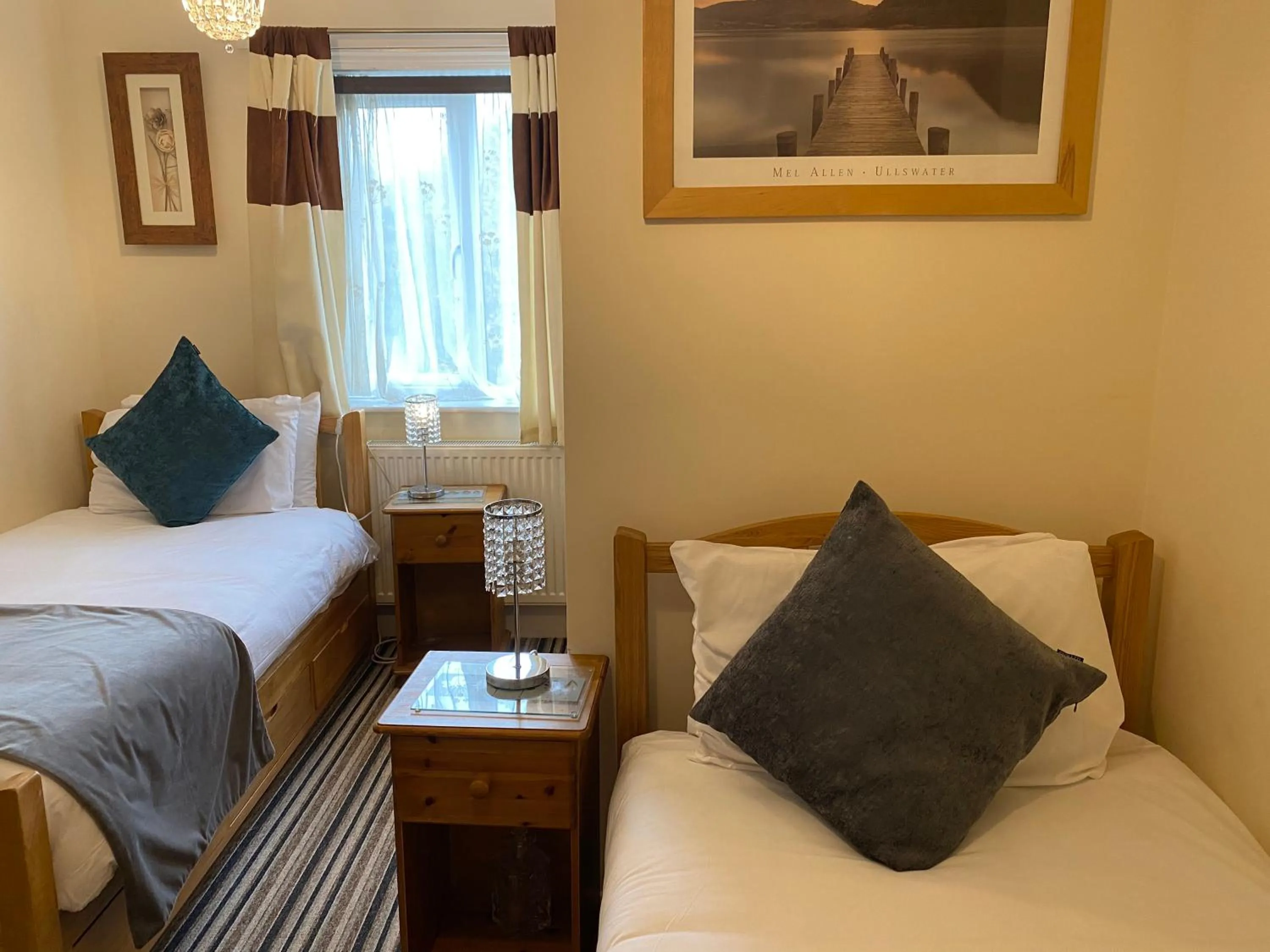 Bed in Four Seasons Guest House