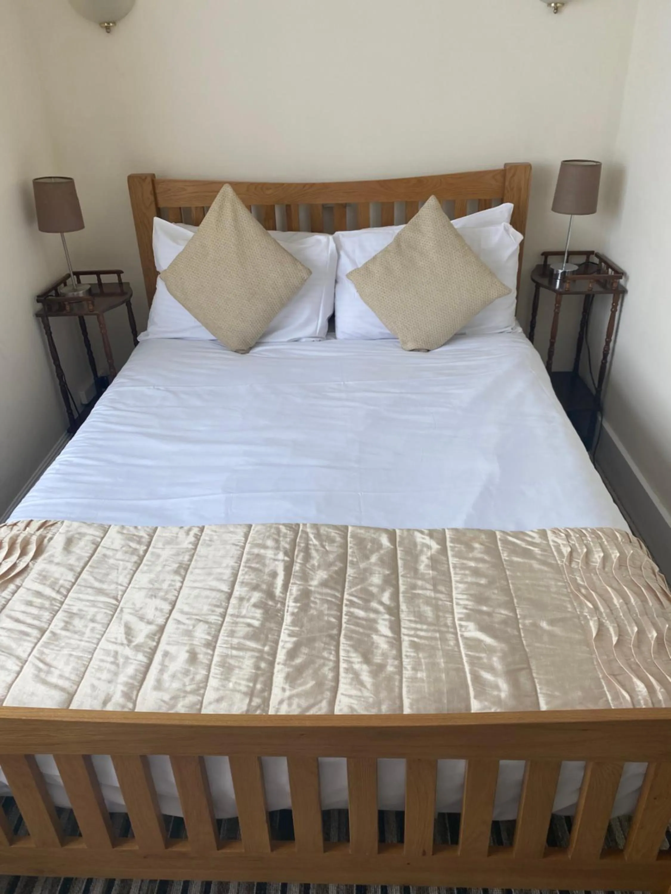 Bed in Four Seasons Guest House