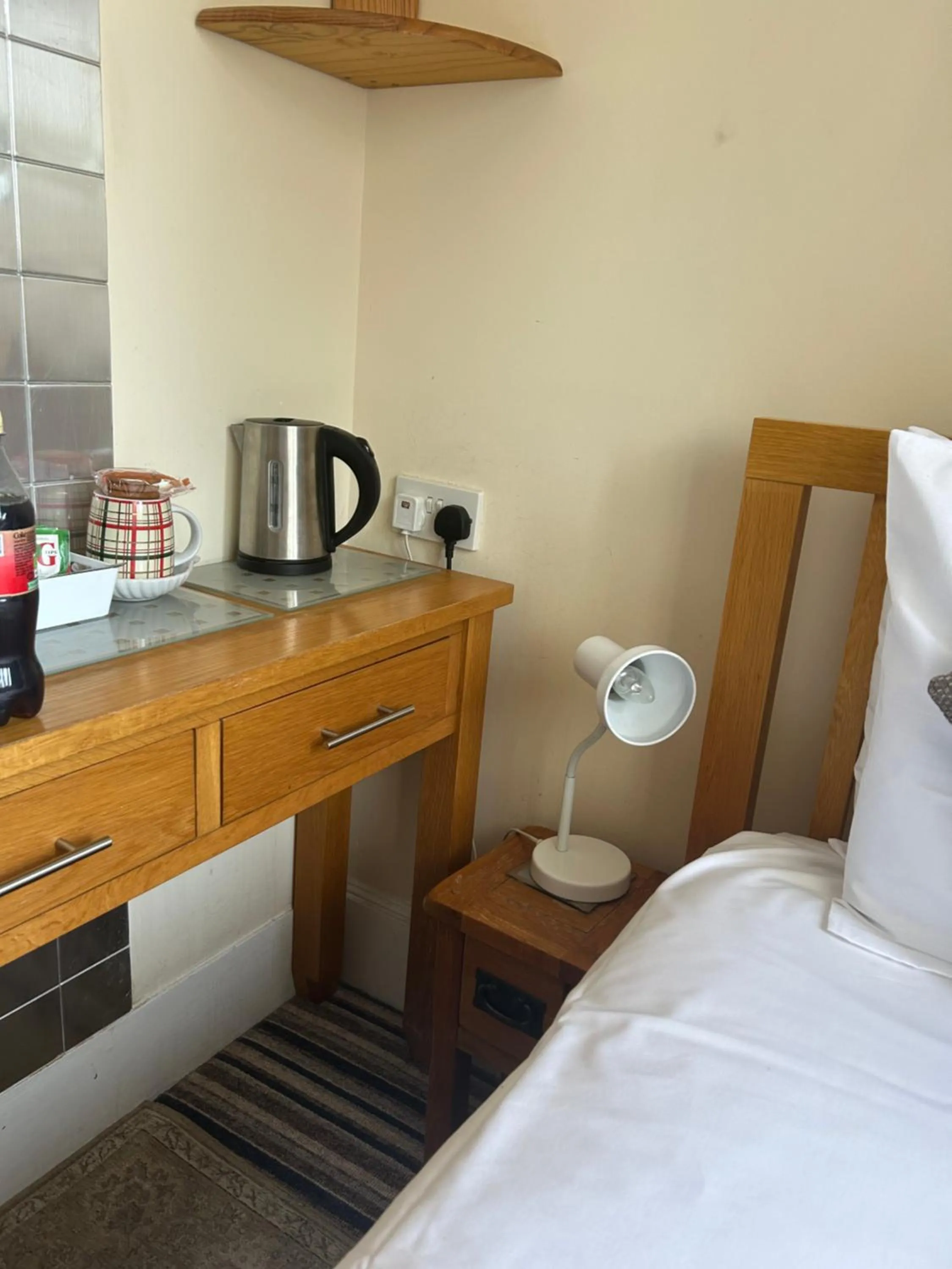 Bed in Four Seasons Guest House