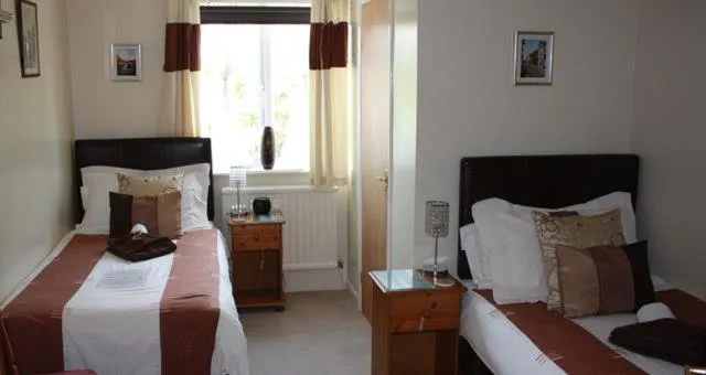 Photo of the whole room, Bed in Four Seasons Guest House