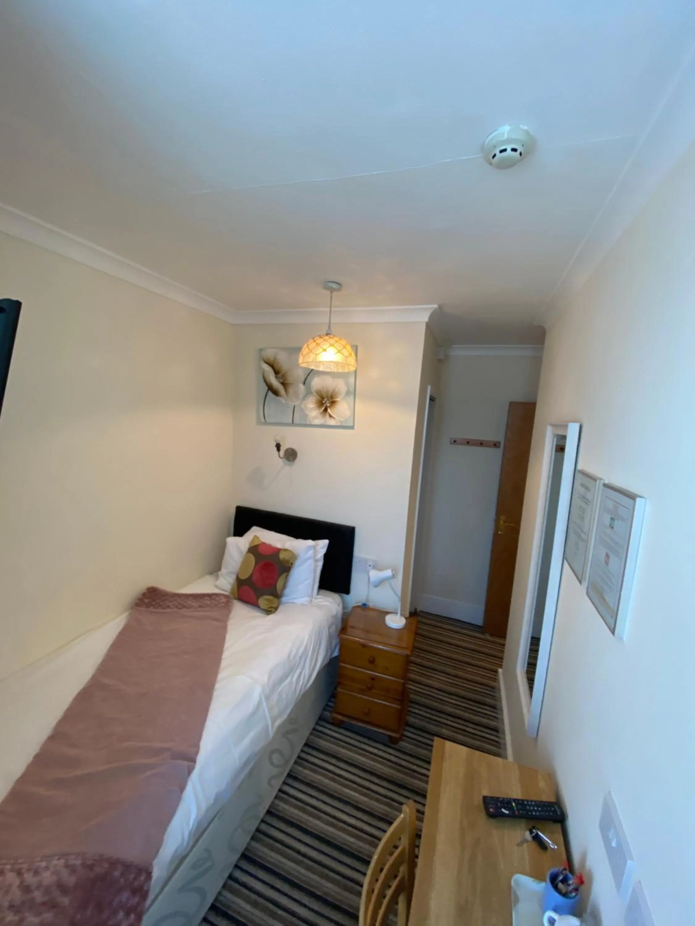 Bed in Four Seasons Guest House