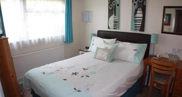 Photo of the whole room, Bed in Four Seasons Guest House