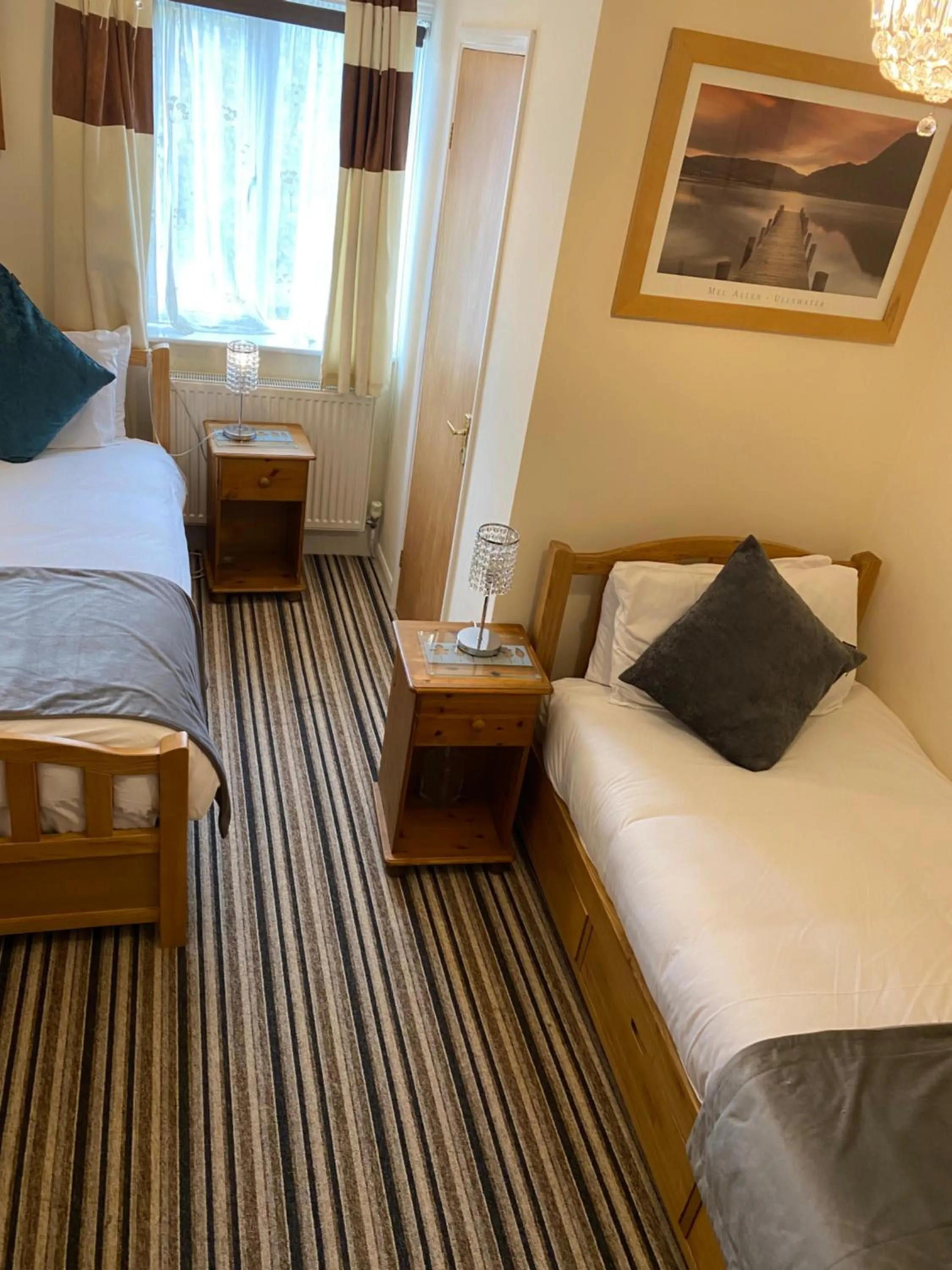 Bed in Four Seasons Guest House