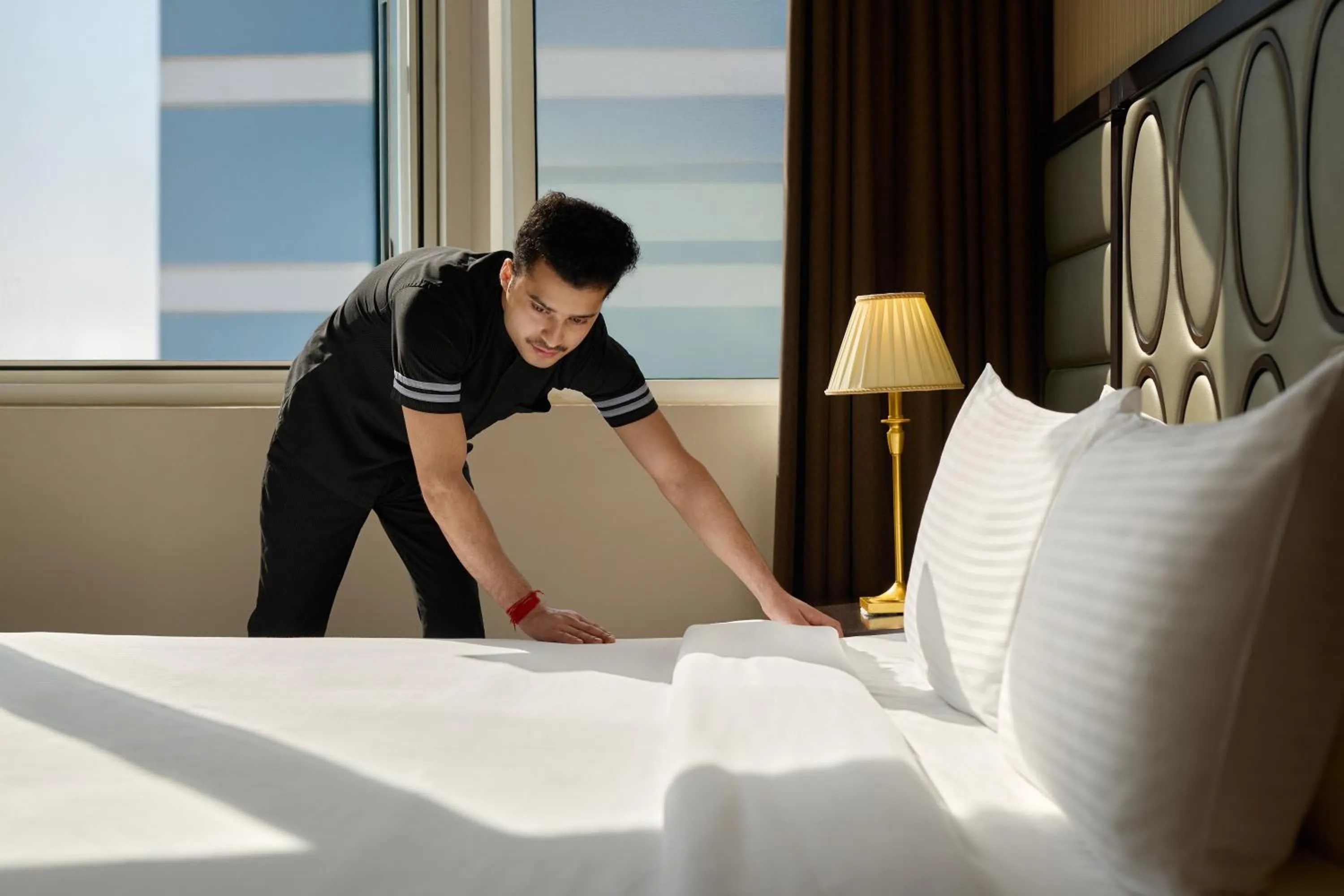 Staff, Bed in Golden Tulip Doha Hotel