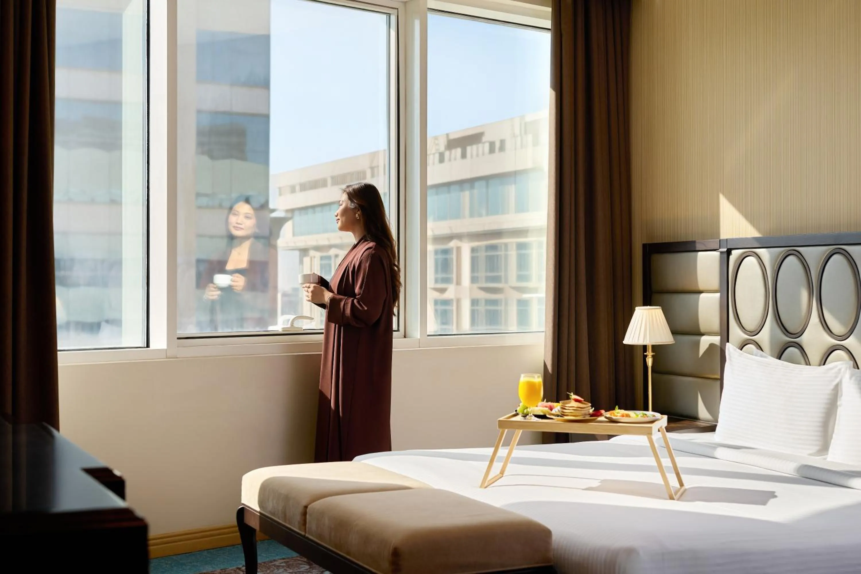 Bed in Golden Tulip Doha Hotel