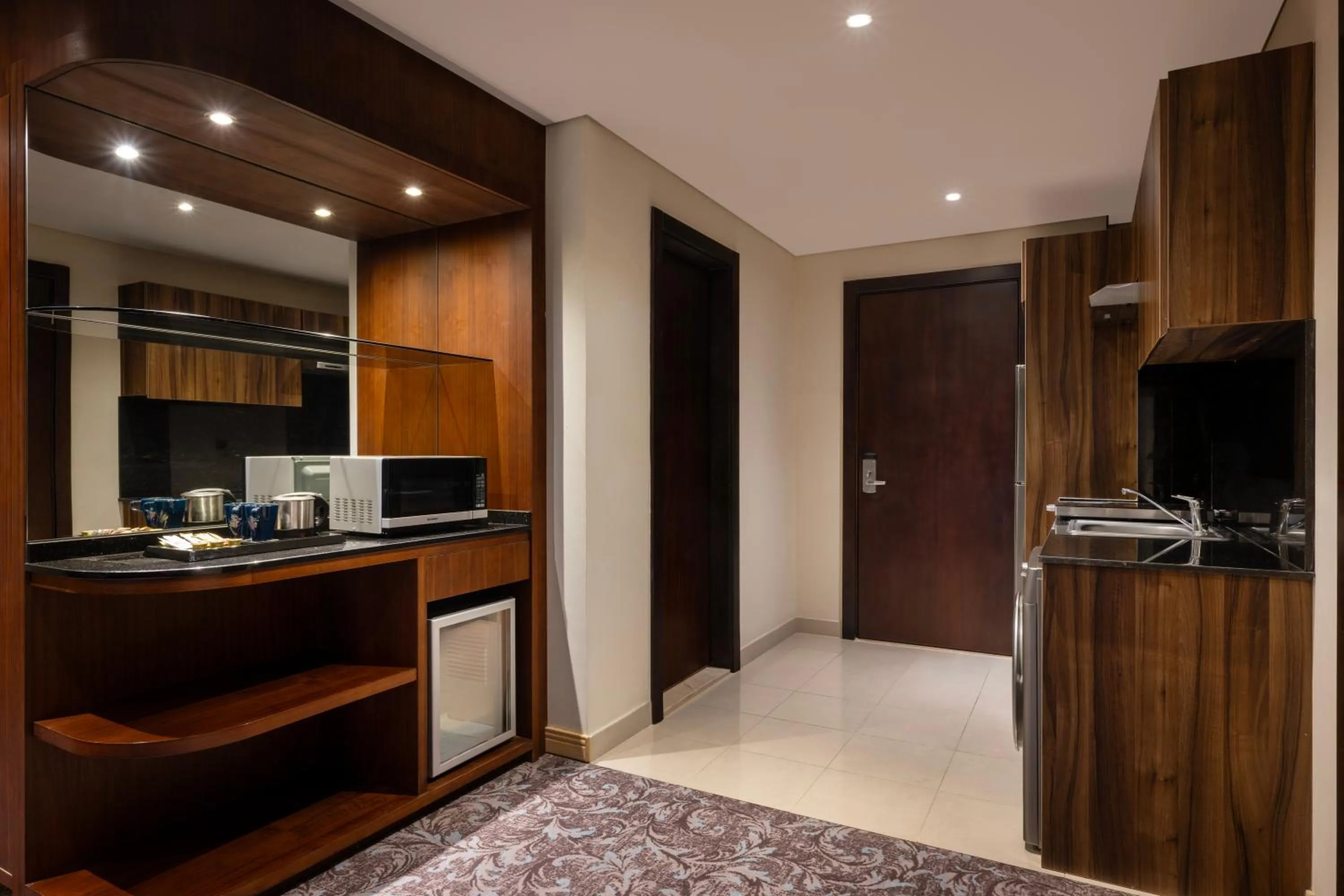 Kitchen or kitchenette in Golden Tulip Doha Hotel