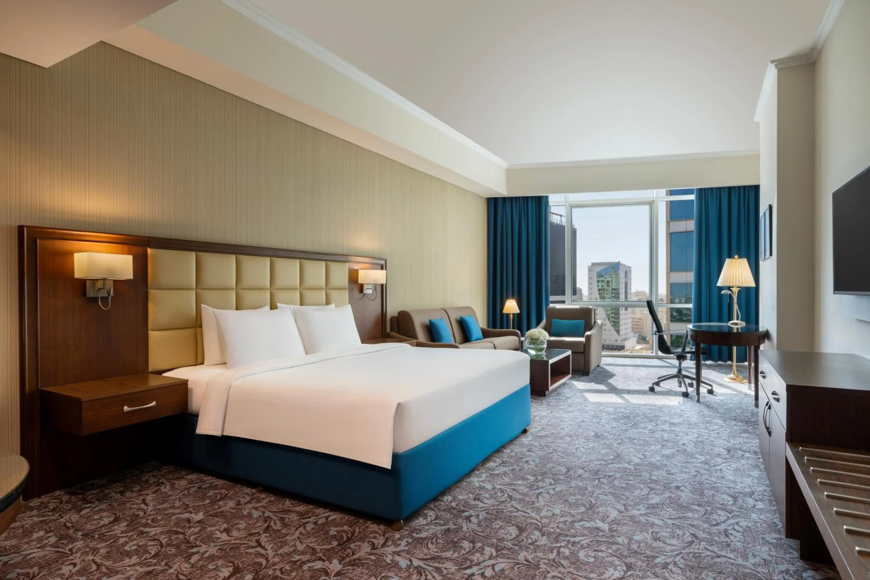 Bed in Golden Tulip Doha Hotel