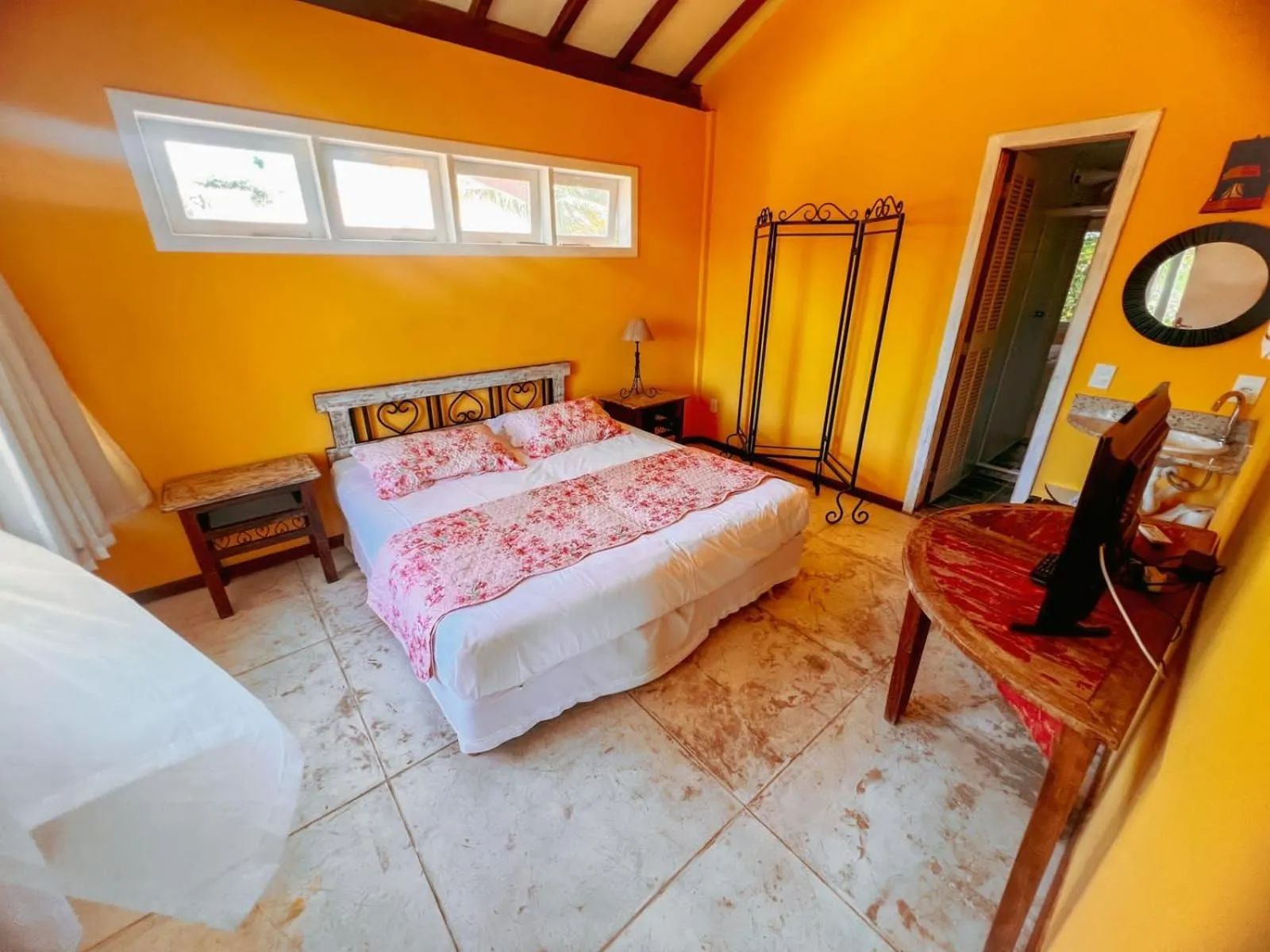 Bed in Bon Bini Pousada