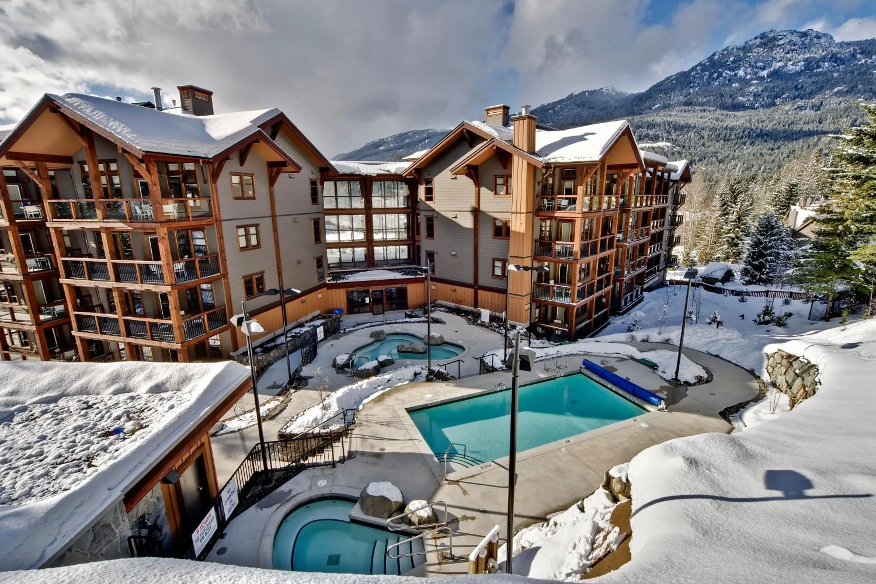 Swimming pool in Evolution Whistler, by Lodging Ovations