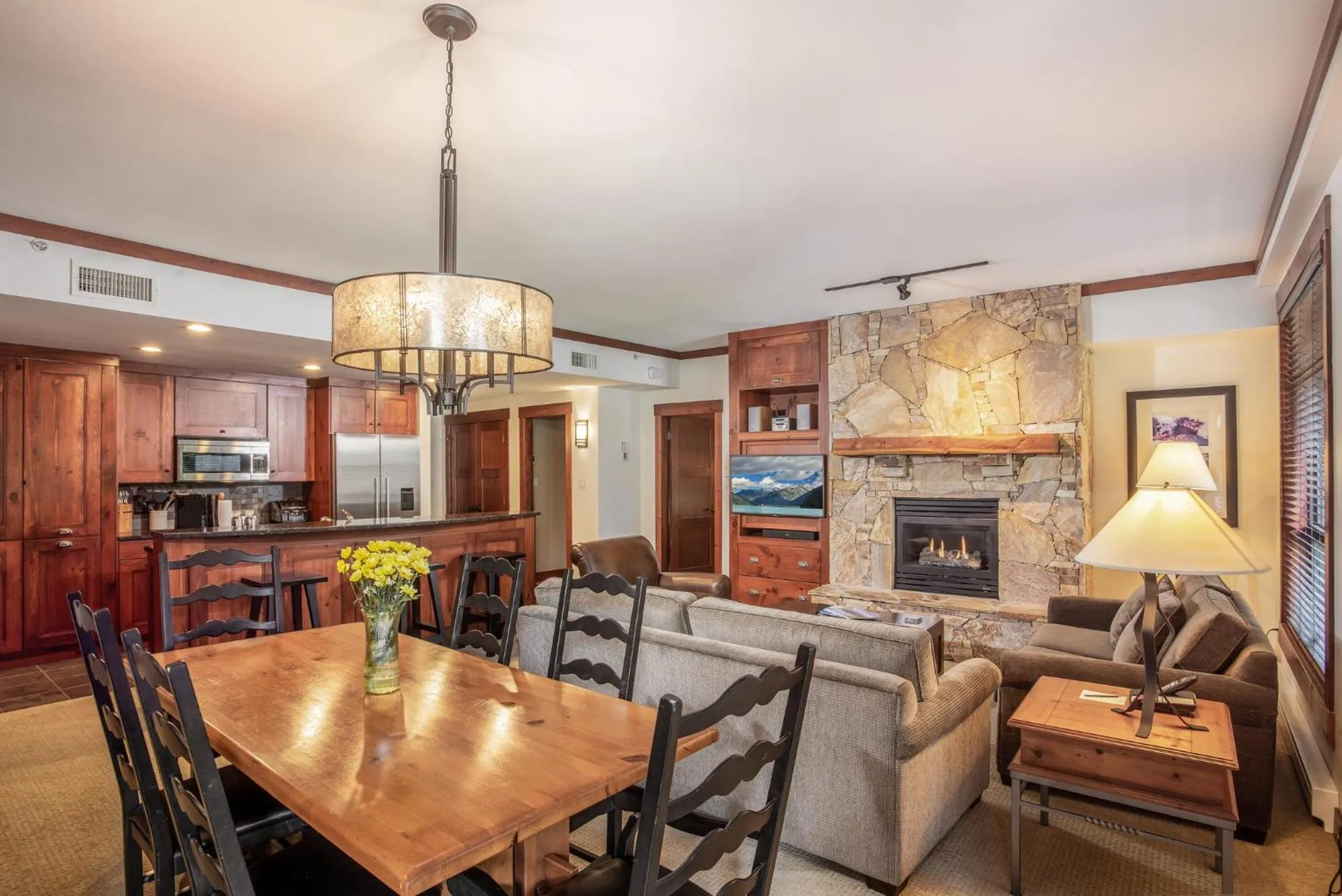 Living room in First Tracks Lodge, by Lodging Ovations