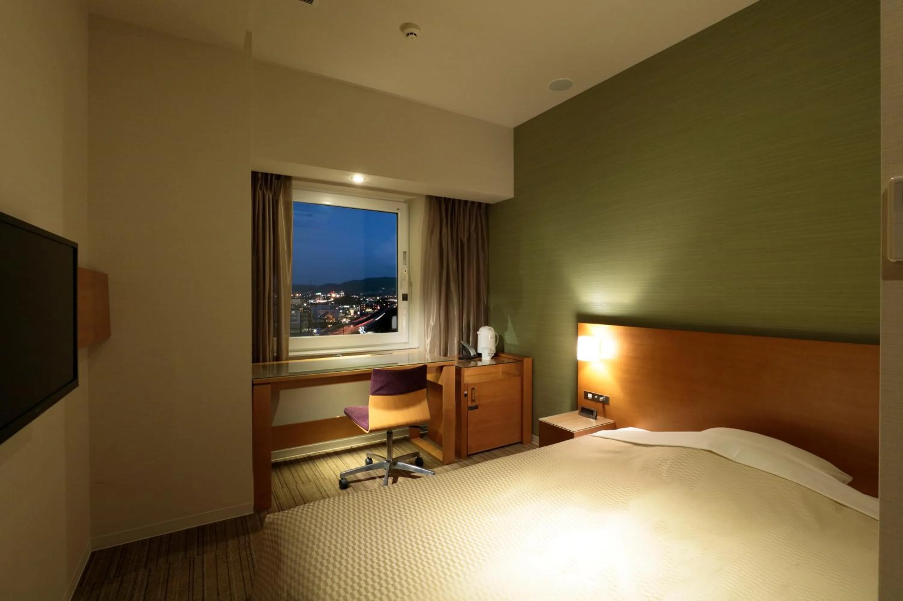 Bed in Candeo Hotels Chino