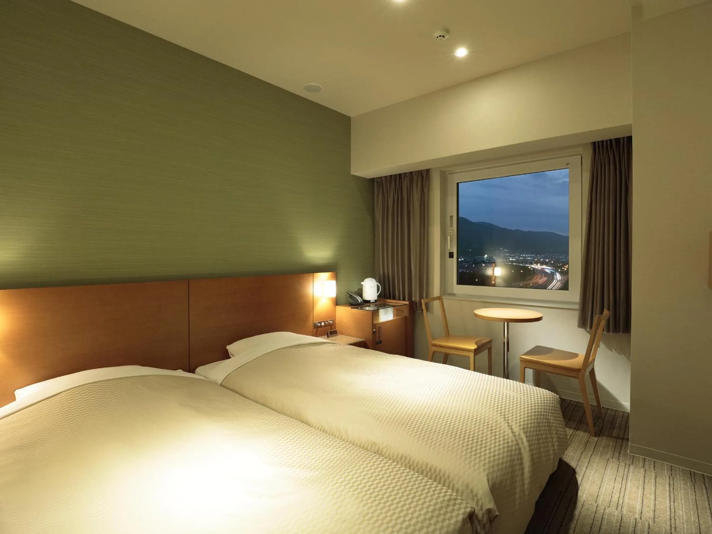 Photo of the whole room, Bed in Candeo Hotels Chino