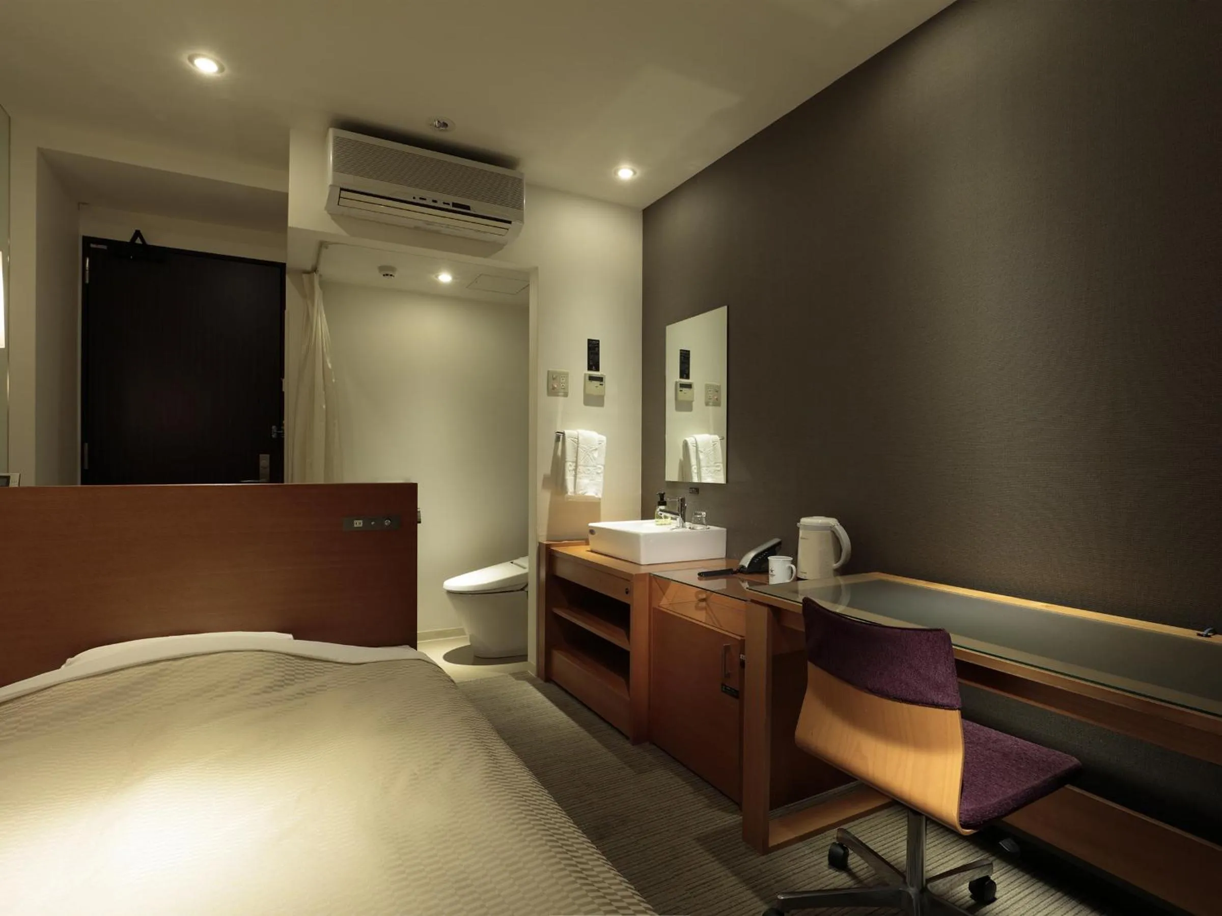 Bed in Candeo Hotels Chino