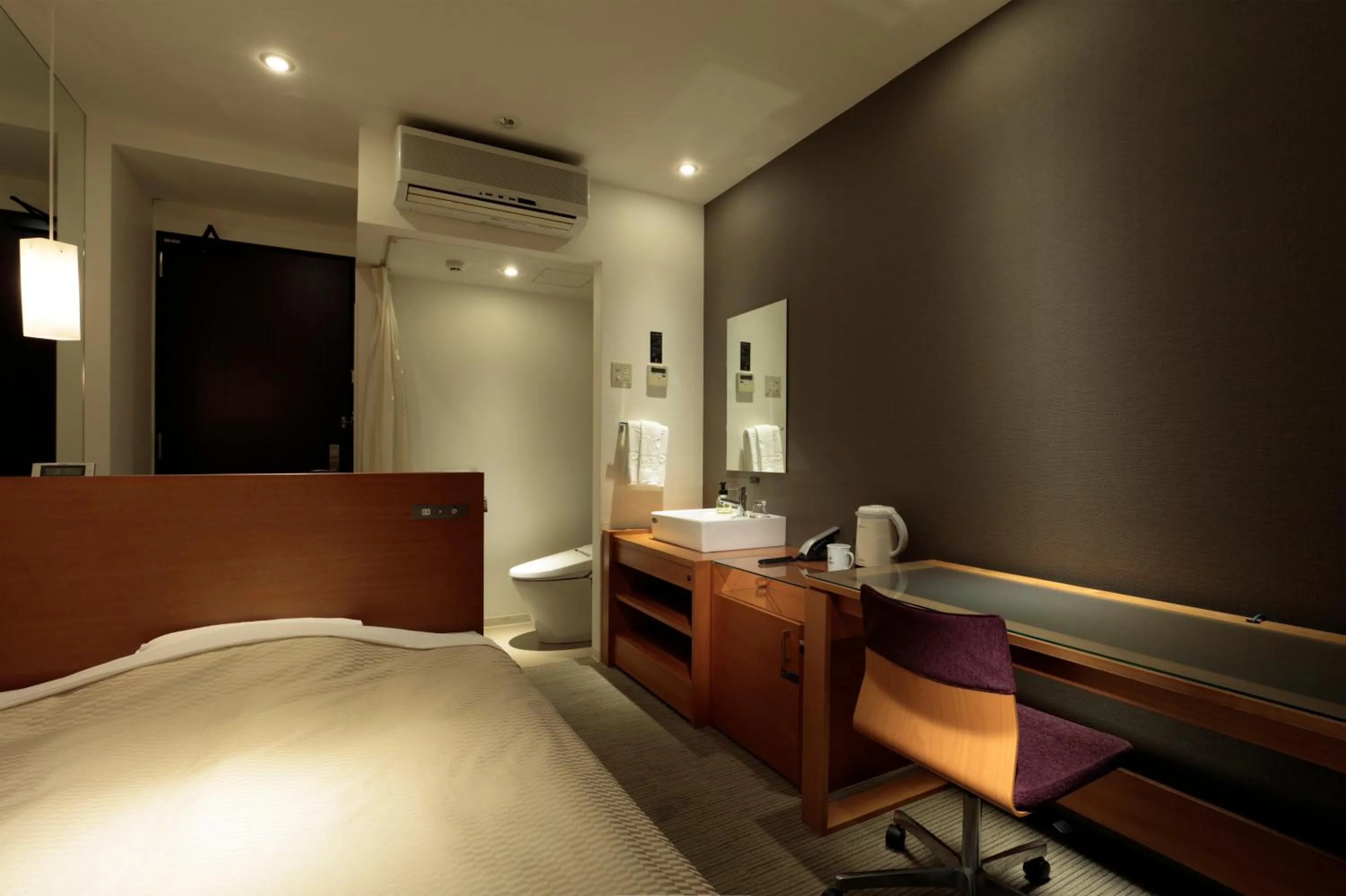 Bed in Candeo Hotels Chino