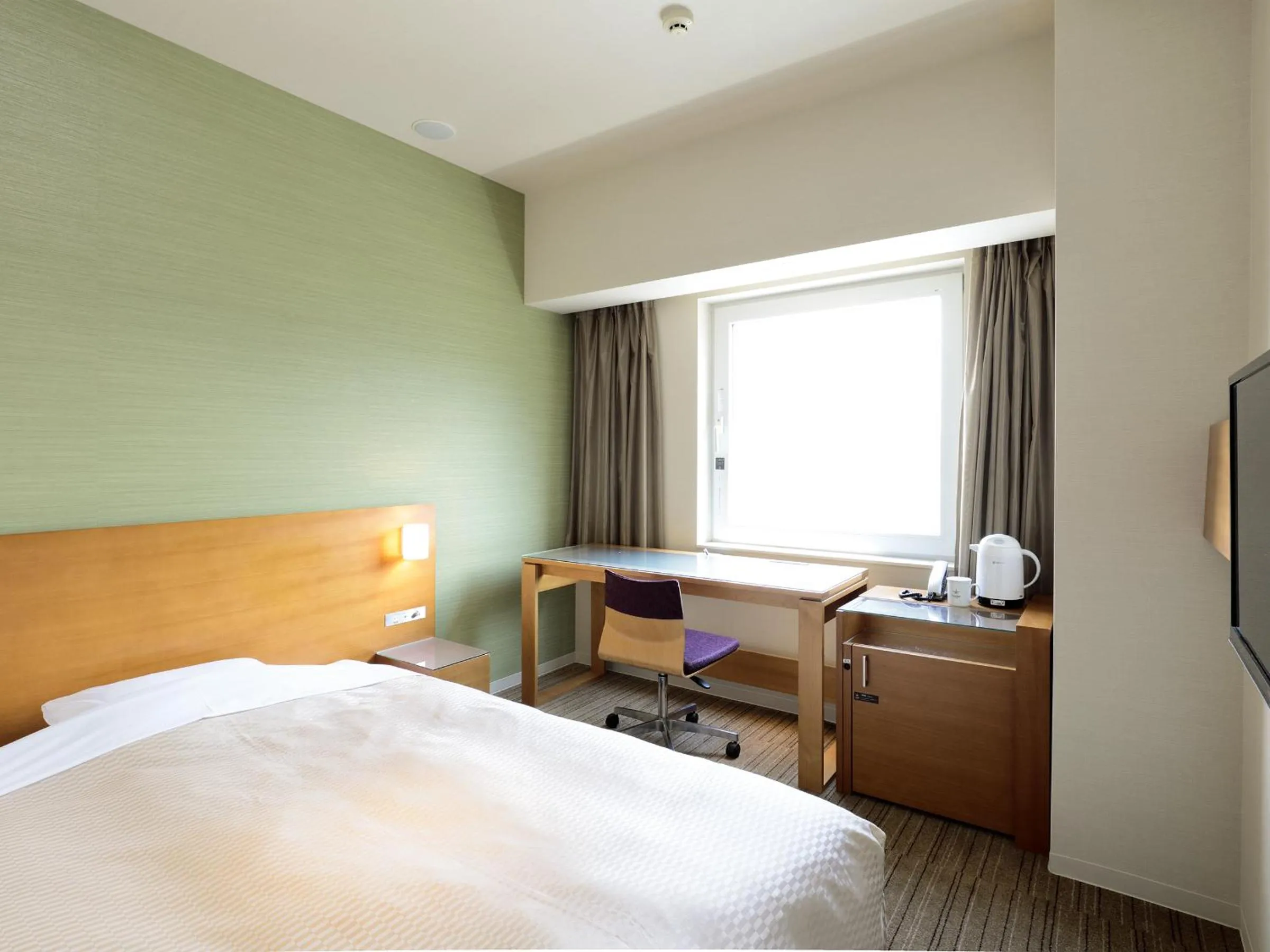 Bed in Candeo Hotels Chino