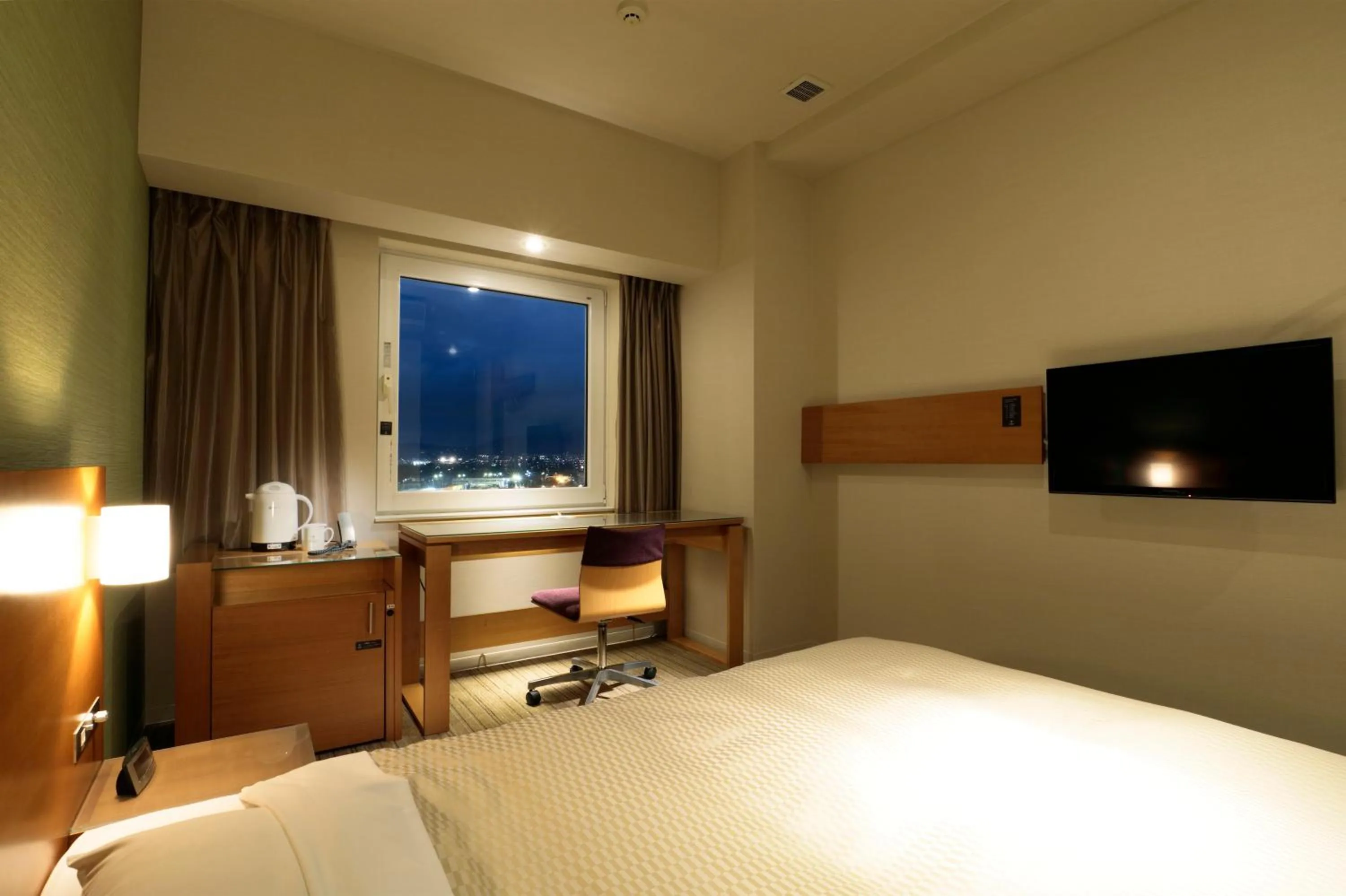 Bed in Candeo Hotels Chino