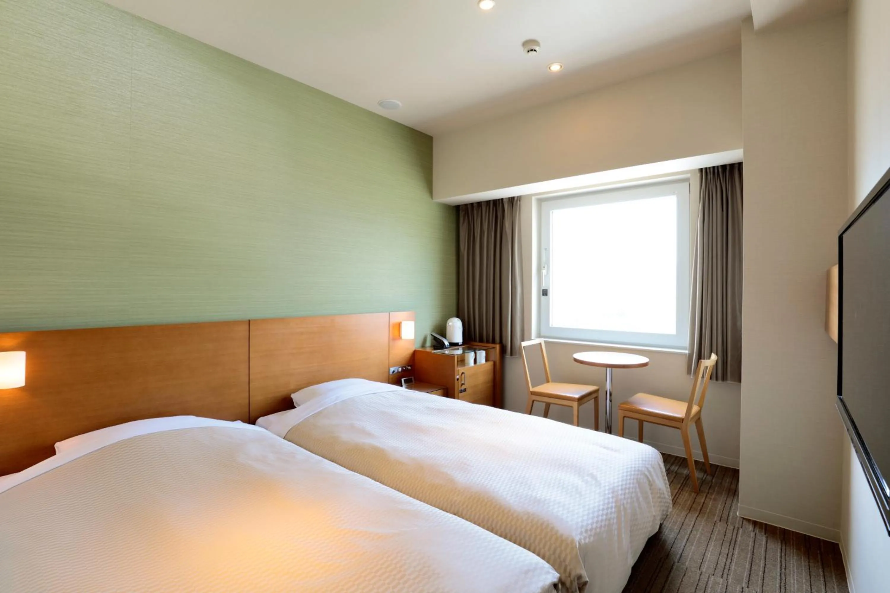 Bed in Candeo Hotels Chino