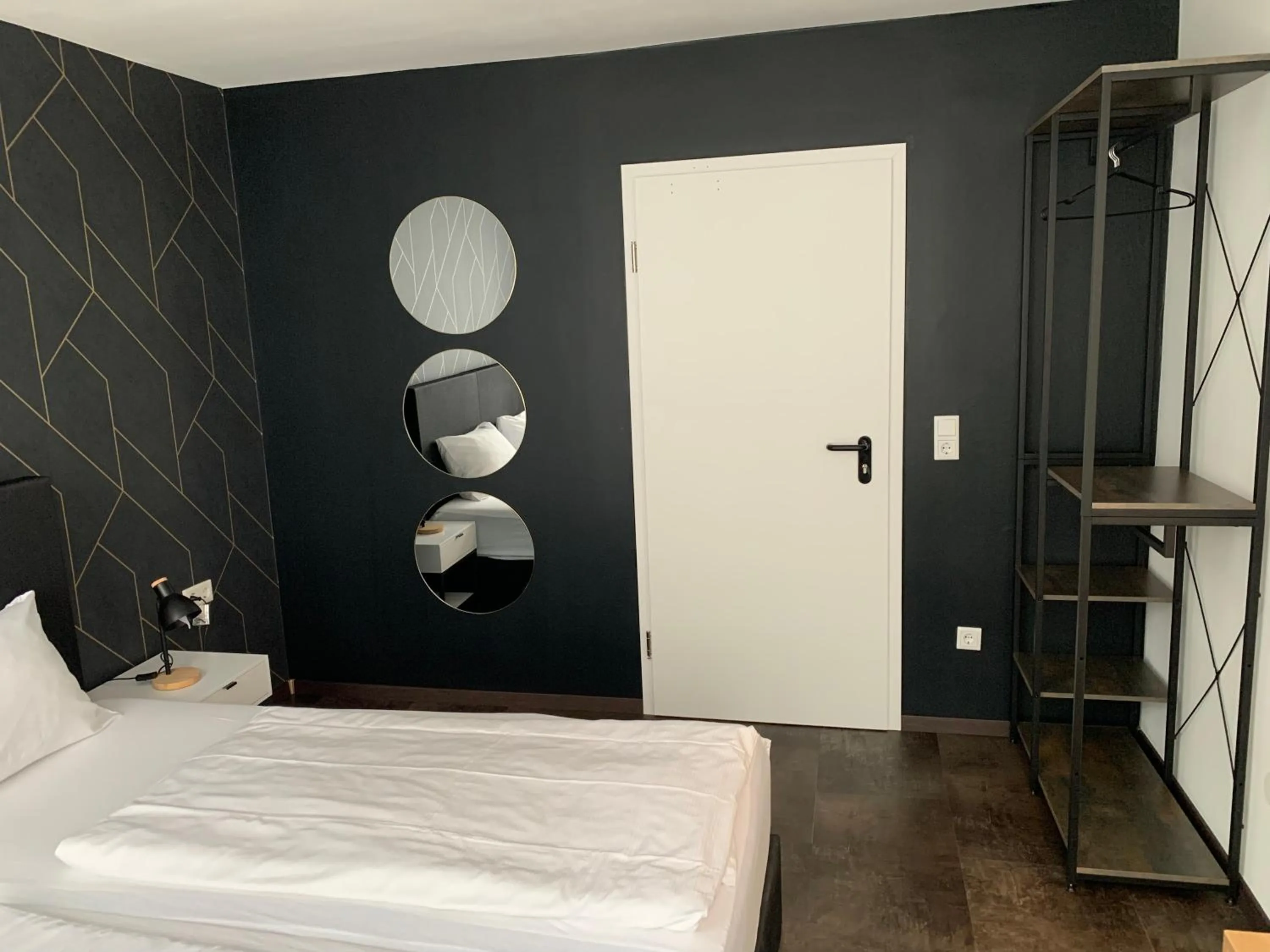Bed in MOTELO Bielefeld - Smart HOTEL