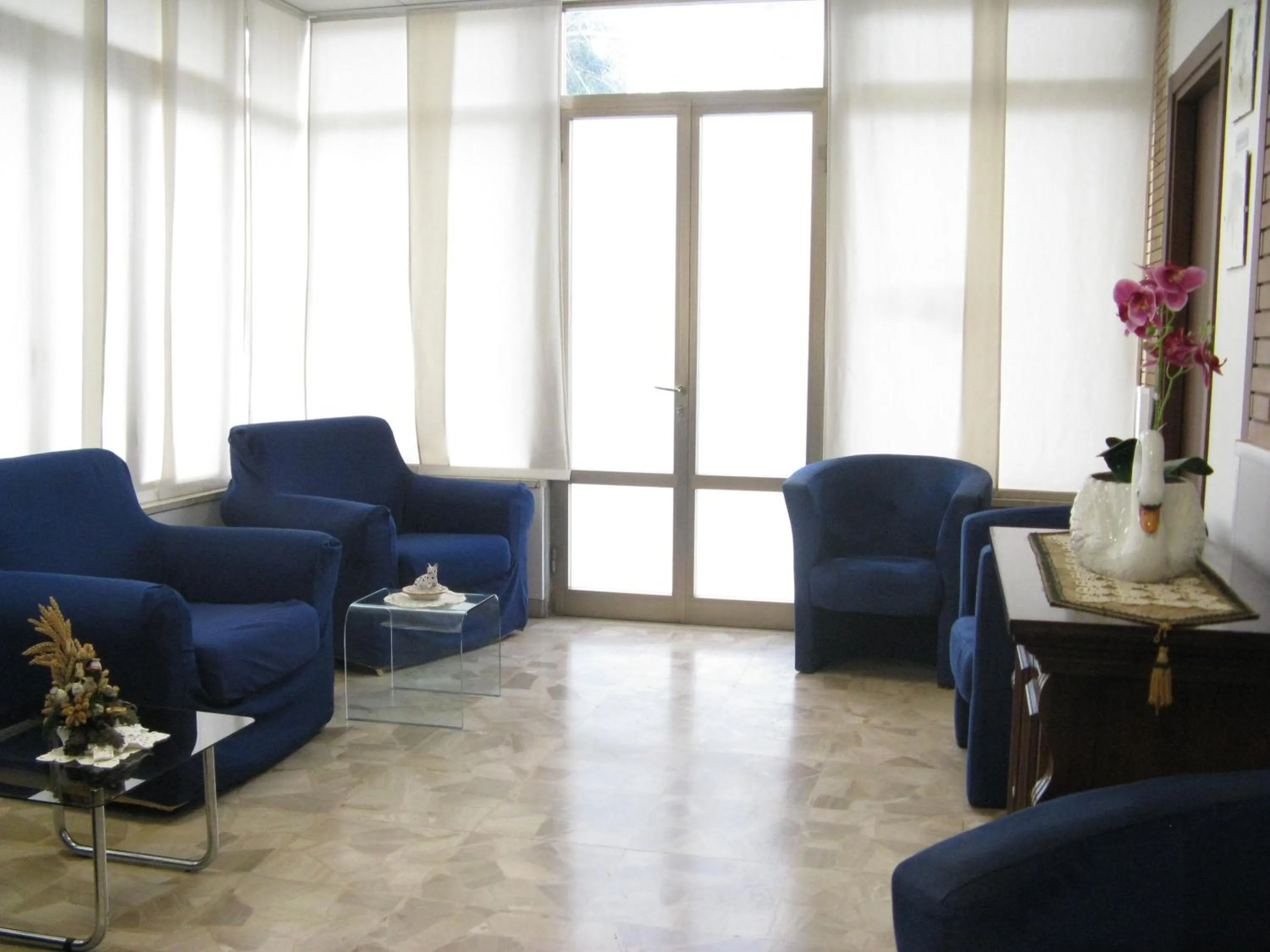 Communal lounge/ TV room in Hotel Luca