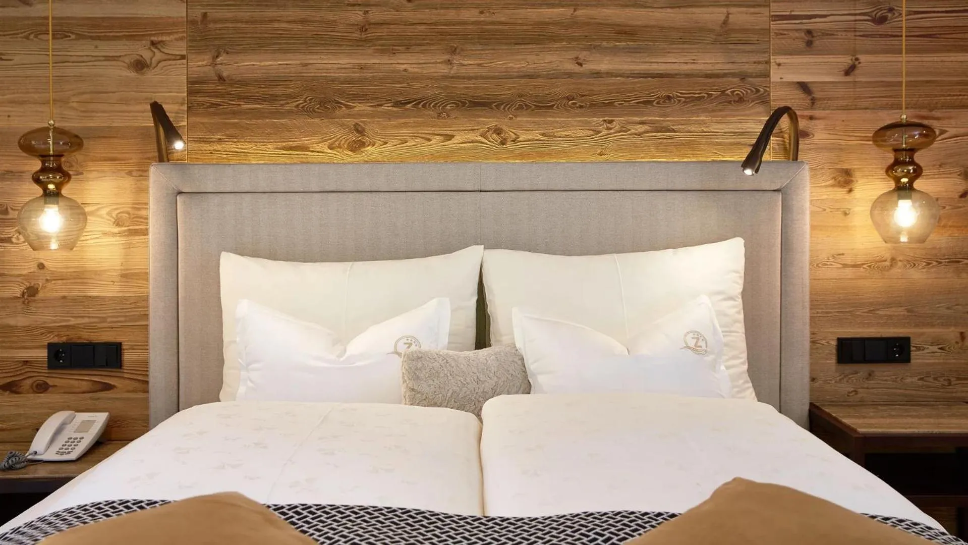 Bed in ZillergrundRock Luxury Mountain Resort