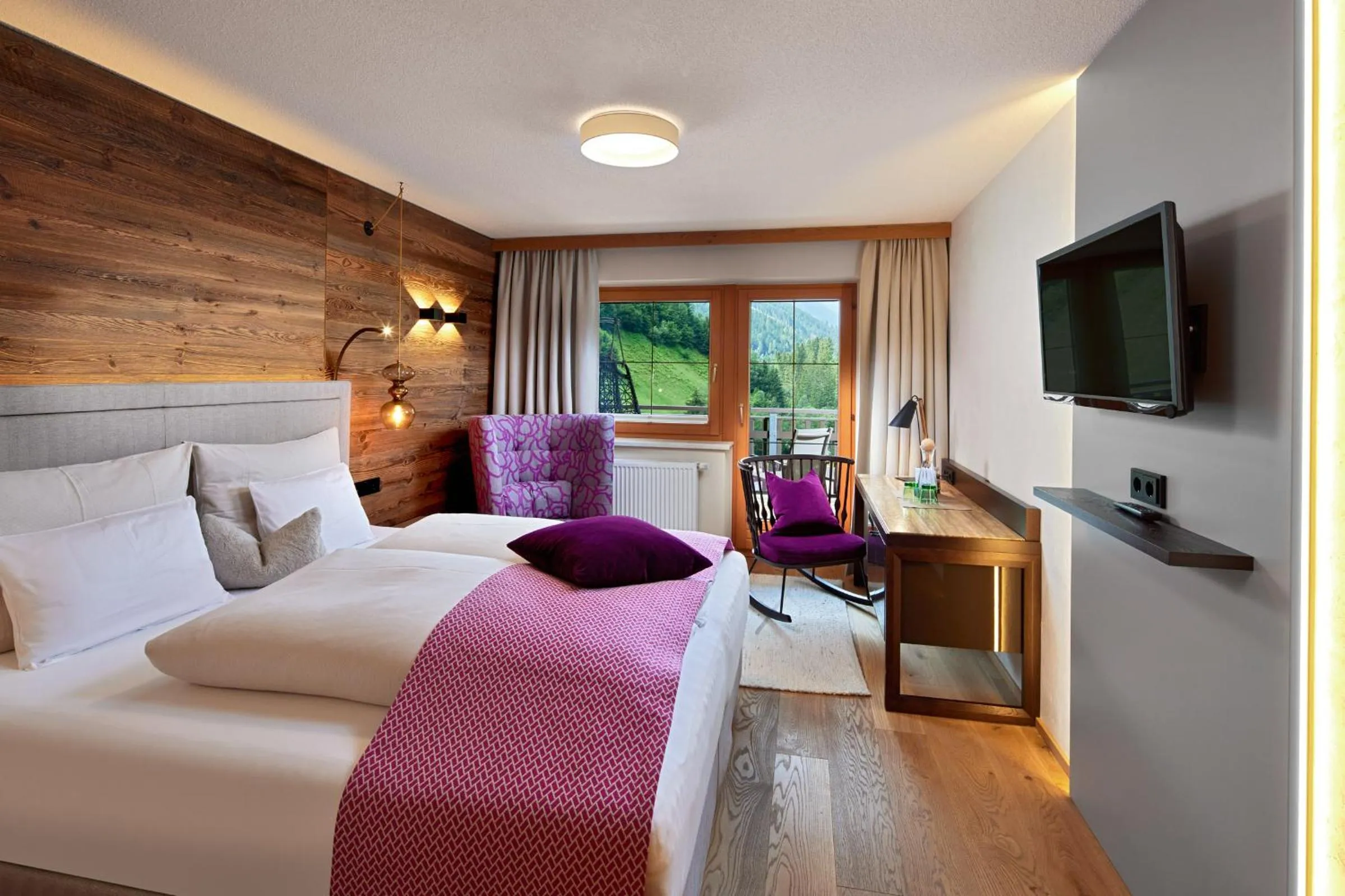 Bed in ZillergrundRock Luxury Mountain Resort