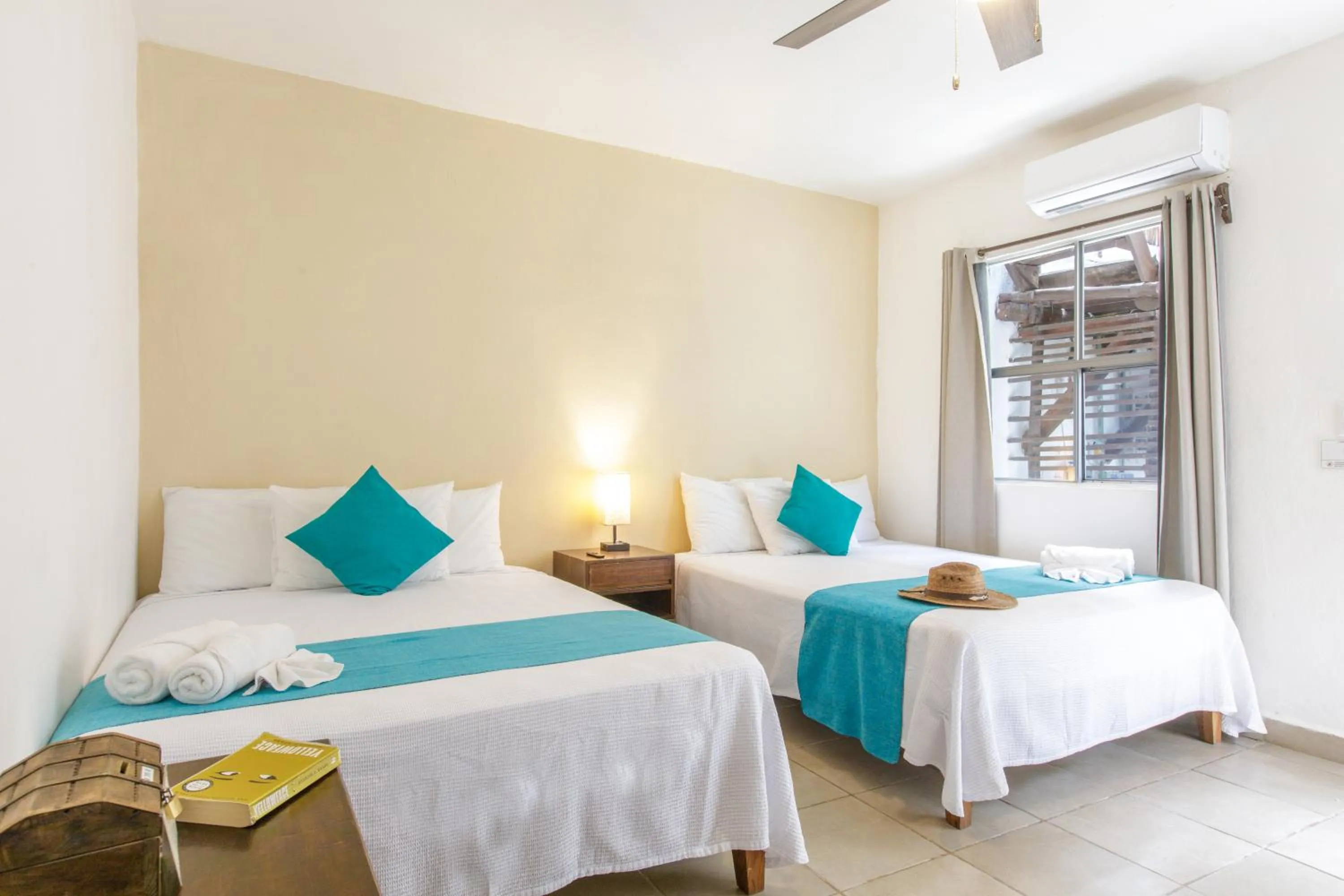 Bed in La Diosa Kali Beach Front Hotel