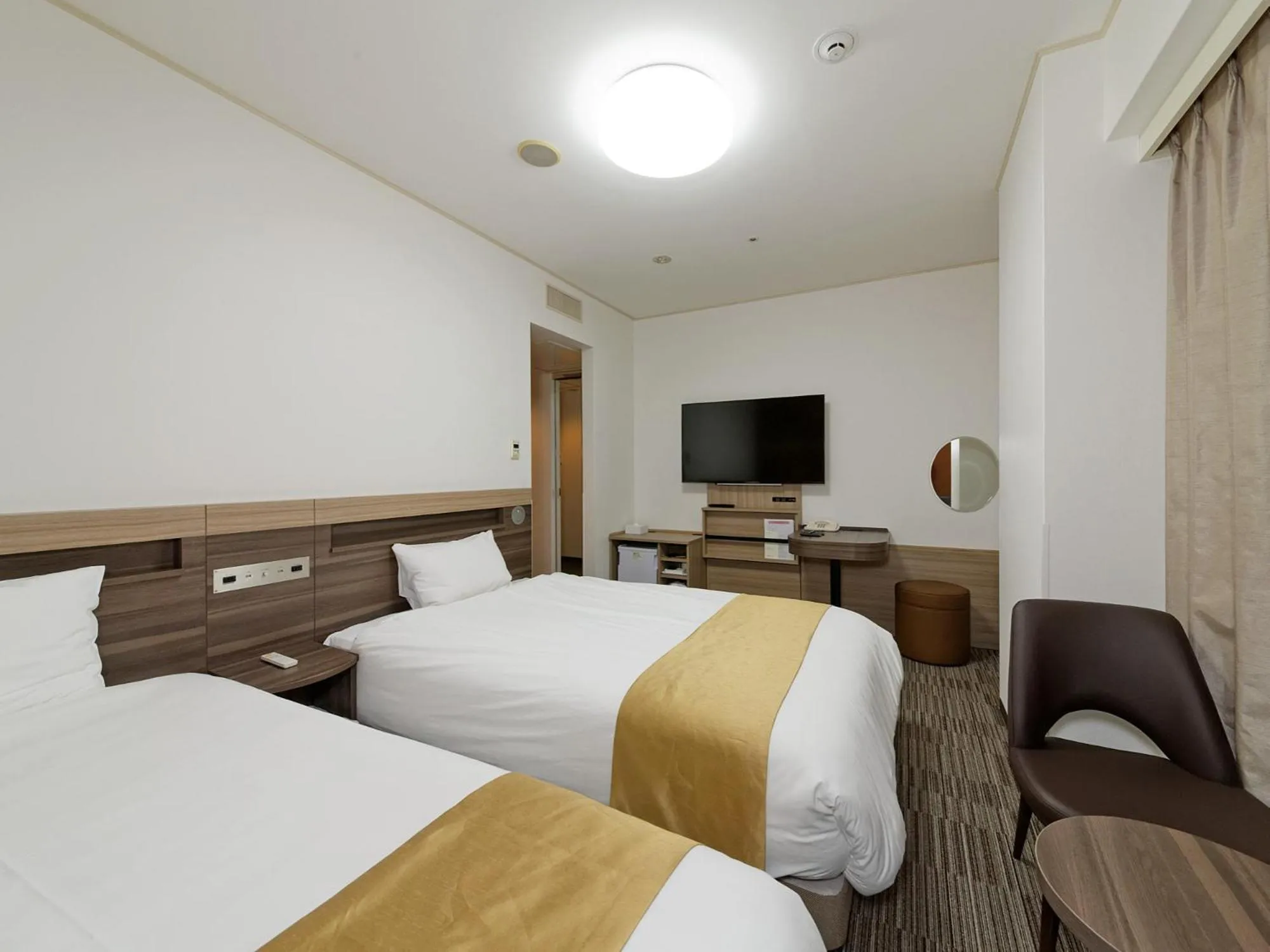 Photo of the whole room, Bed in Hotel Sunroute Sopra Kobe