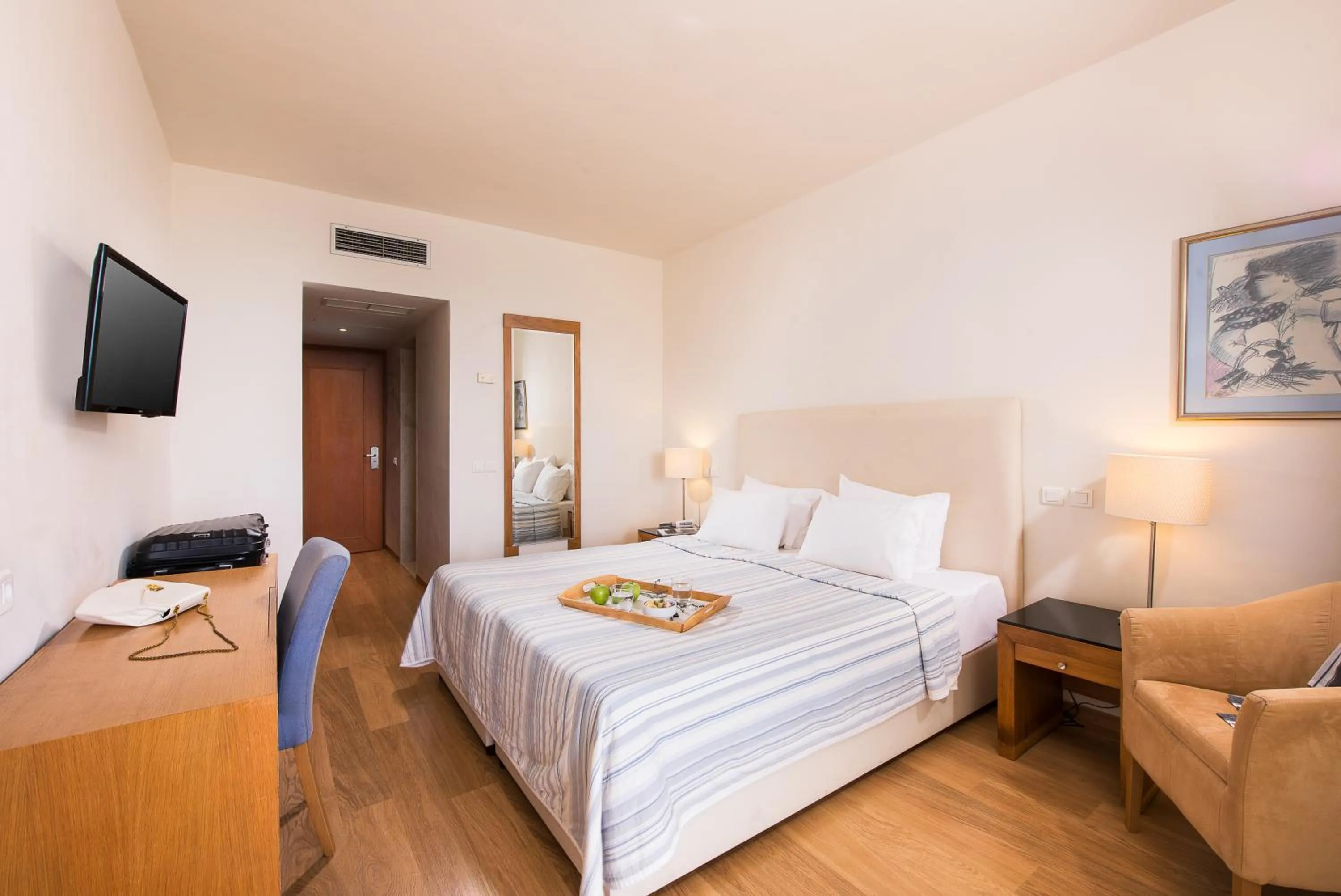 Bed in Kassandra Palace Seaside Resort