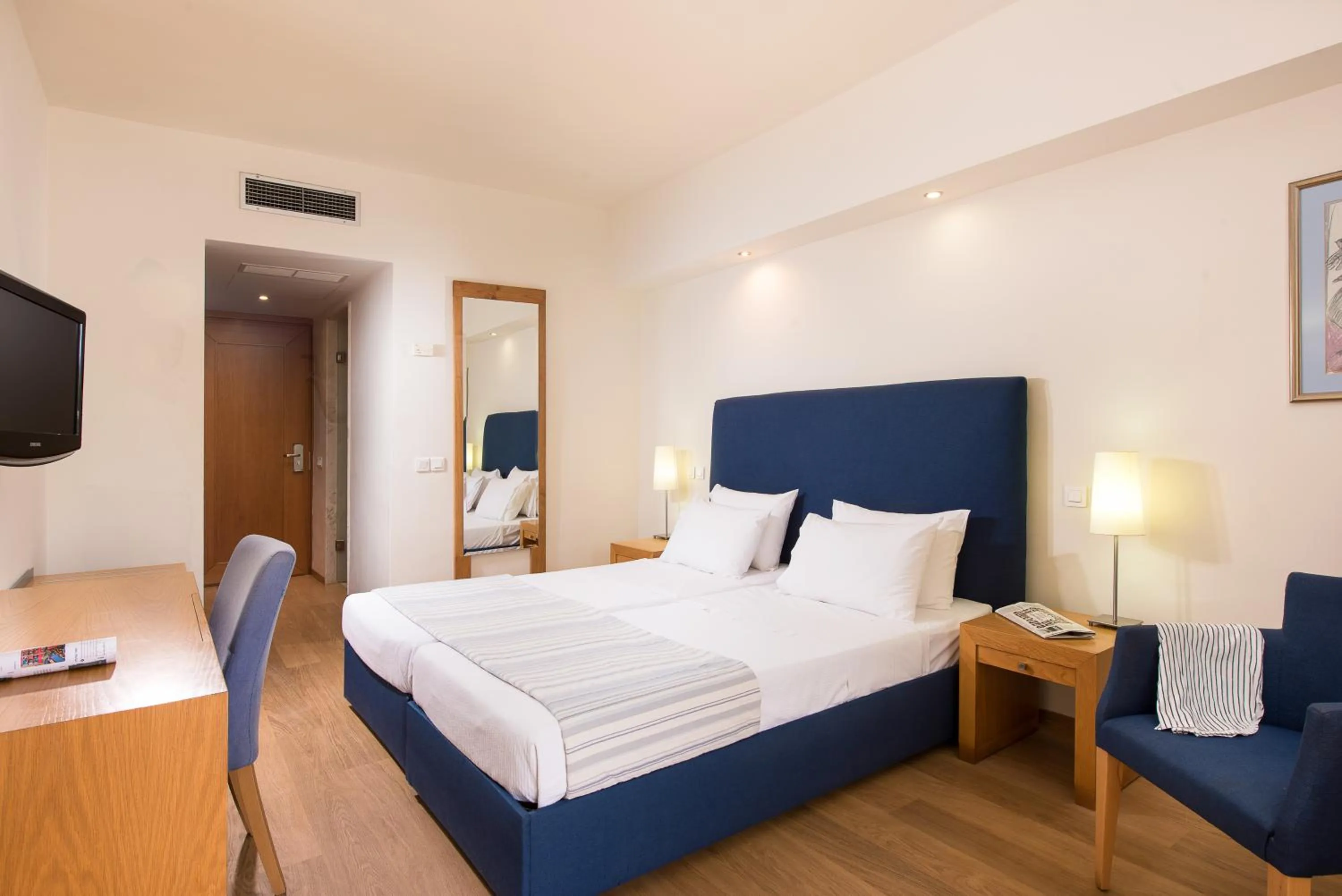 Bed in Kassandra Palace Seaside Resort