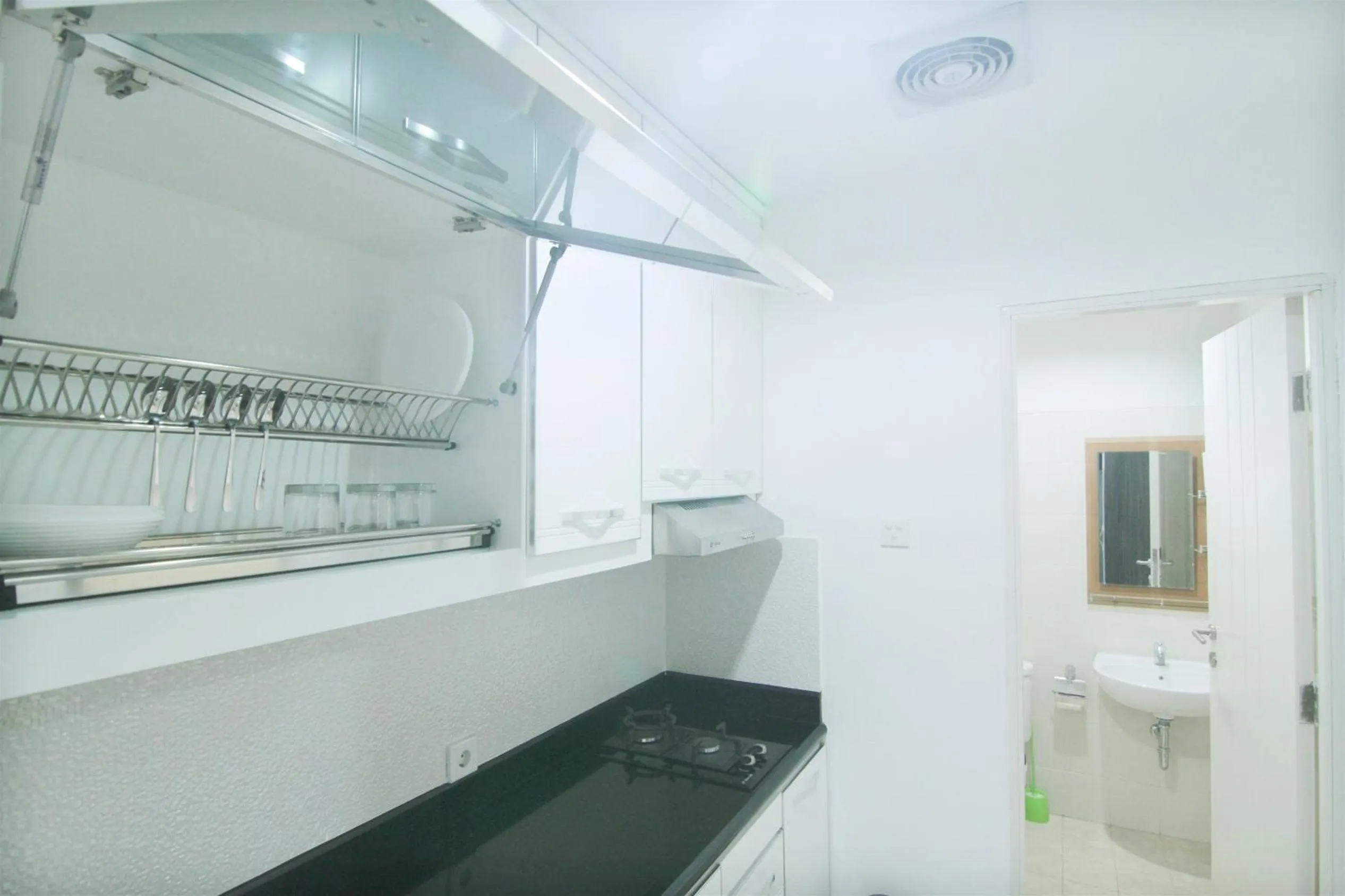 Kitchen or kitchenette in 2BR Cervino Village Casablanca Apartment near Kota Kasablanka By Travelio