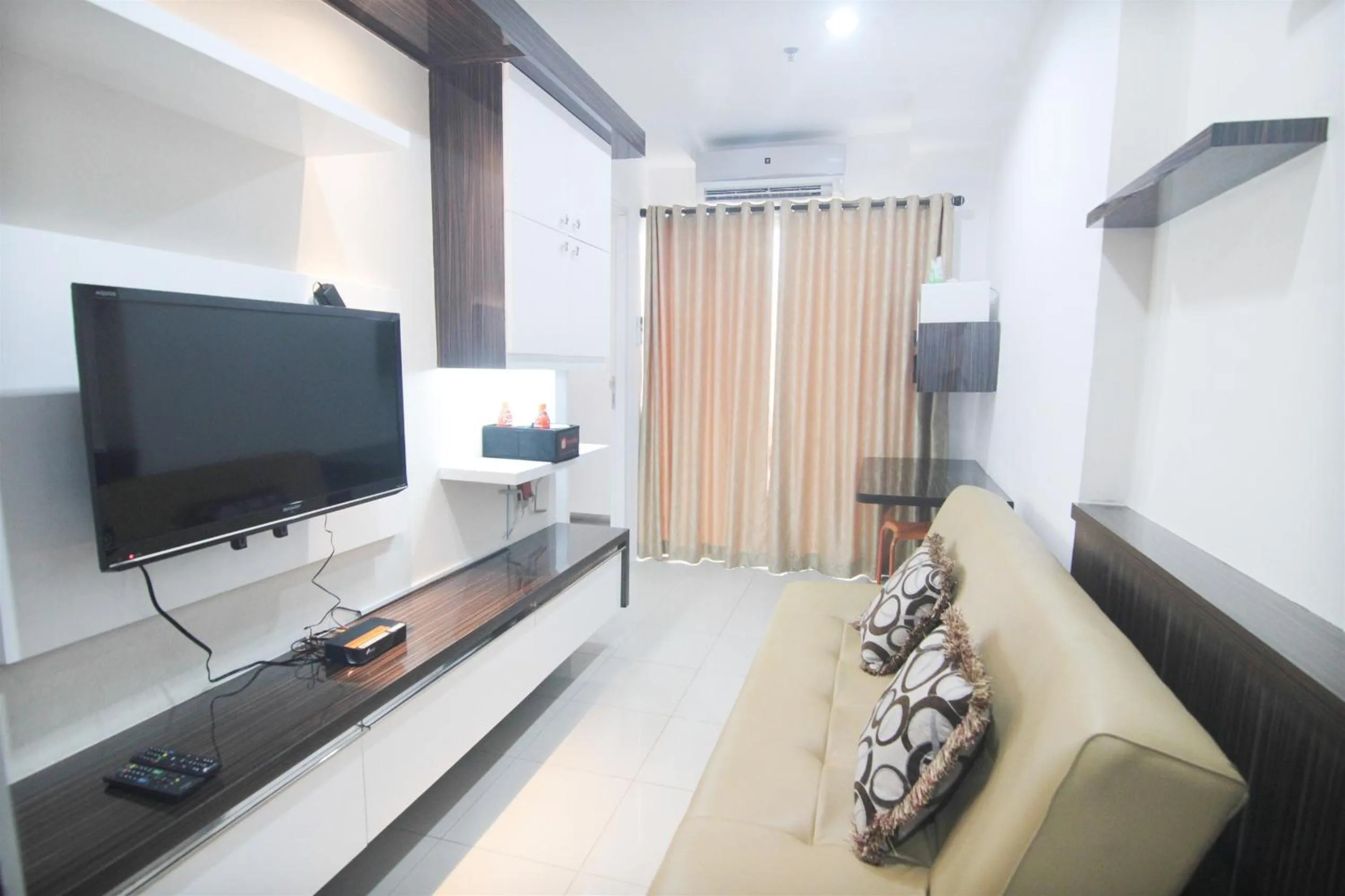 TV and multimedia in 2BR Cervino Village Casablanca Apartment near Kota Kasablanka By Travelio