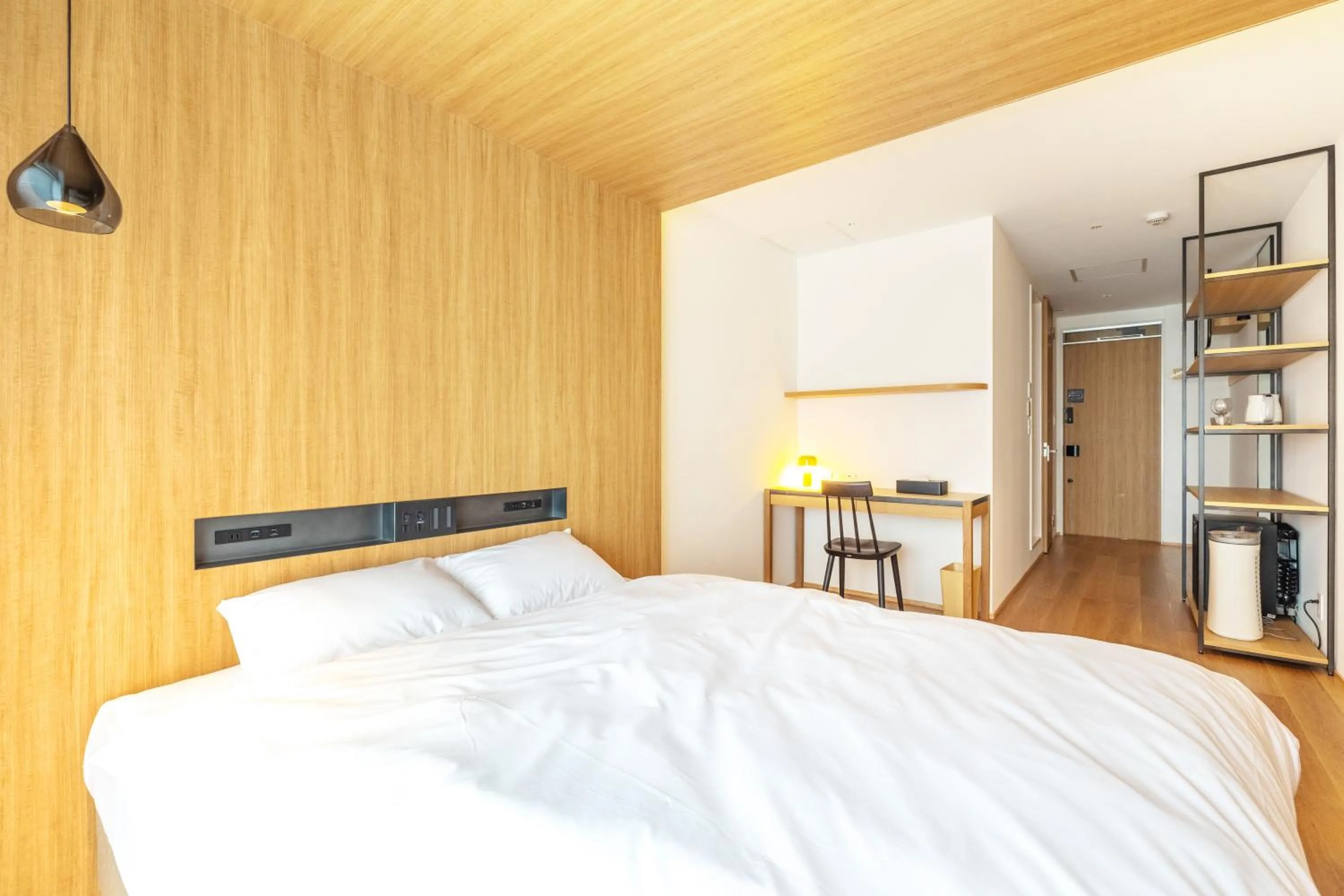 Bed in Karasuma Rokujo Hotel