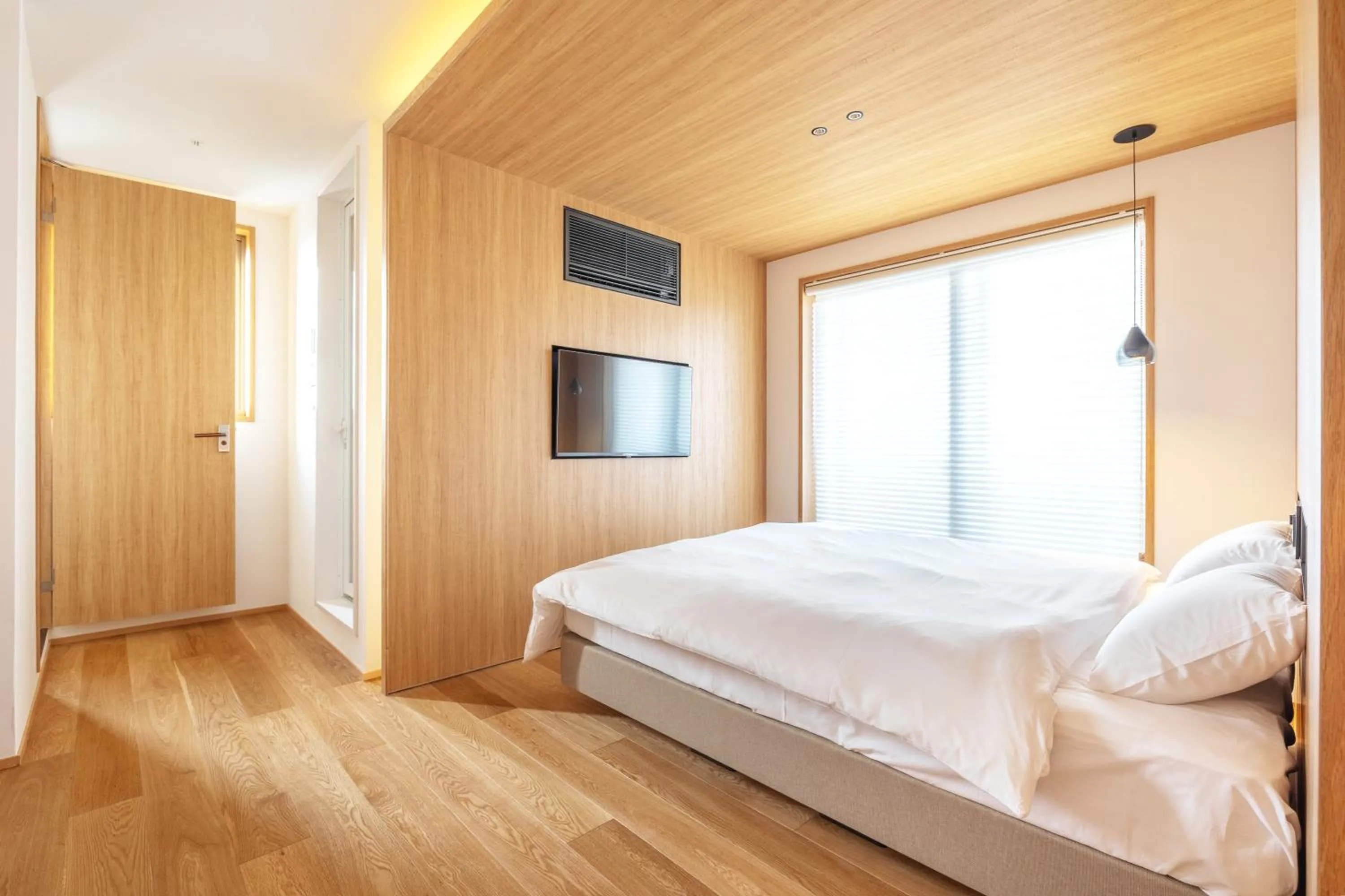 Bed in Karasuma Rokujo Hotel