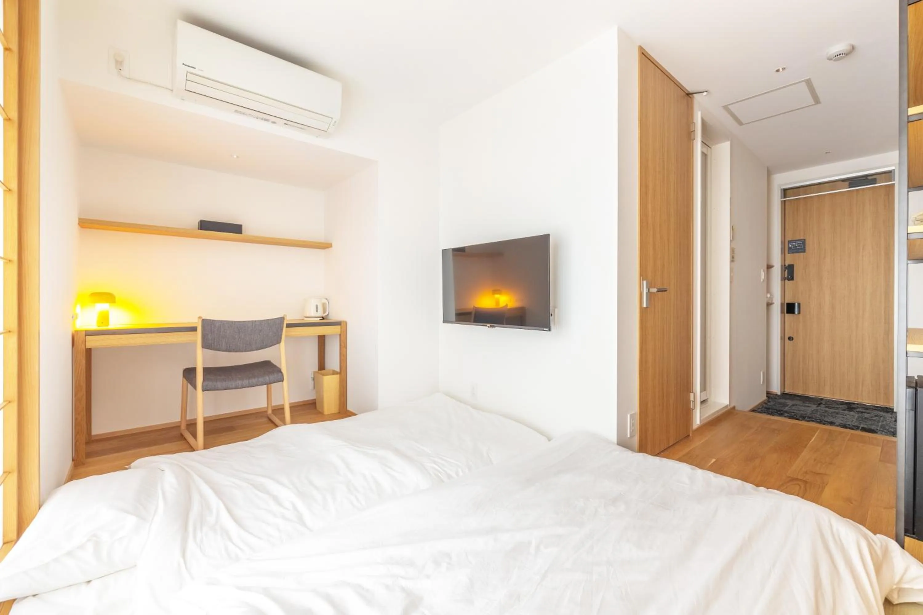 Bed in Karasuma Rokujo Hotel