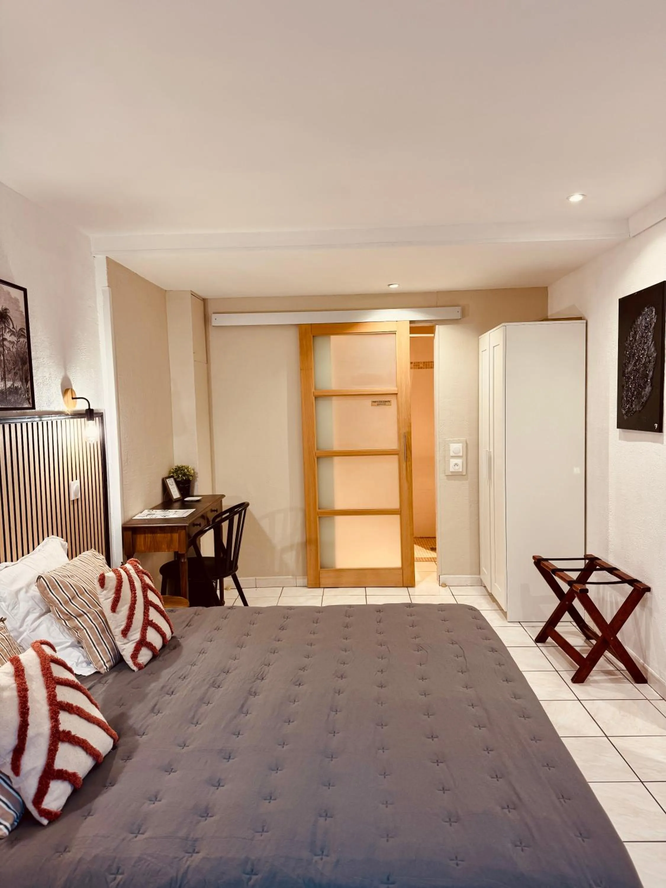 Bed in Hôtel le Nid