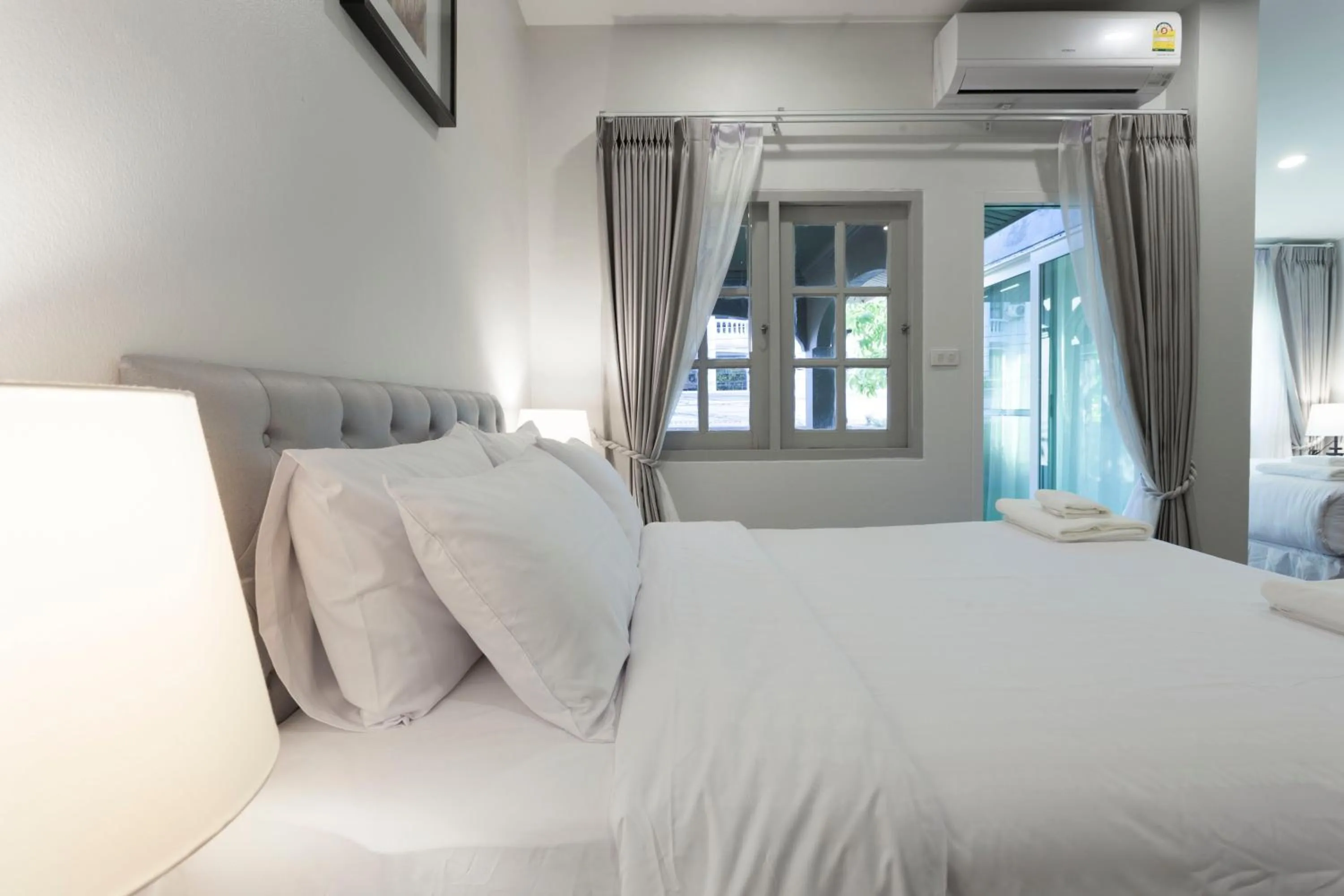 Photo of the whole room, Bed in Cozy Home by Nan