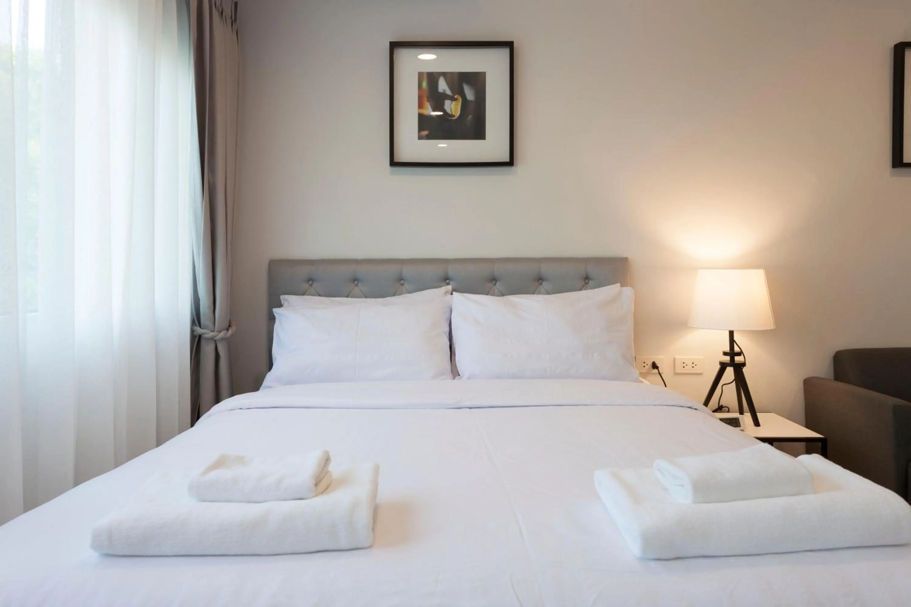 Photo of the whole room, Bed in Cozy Home by Nan