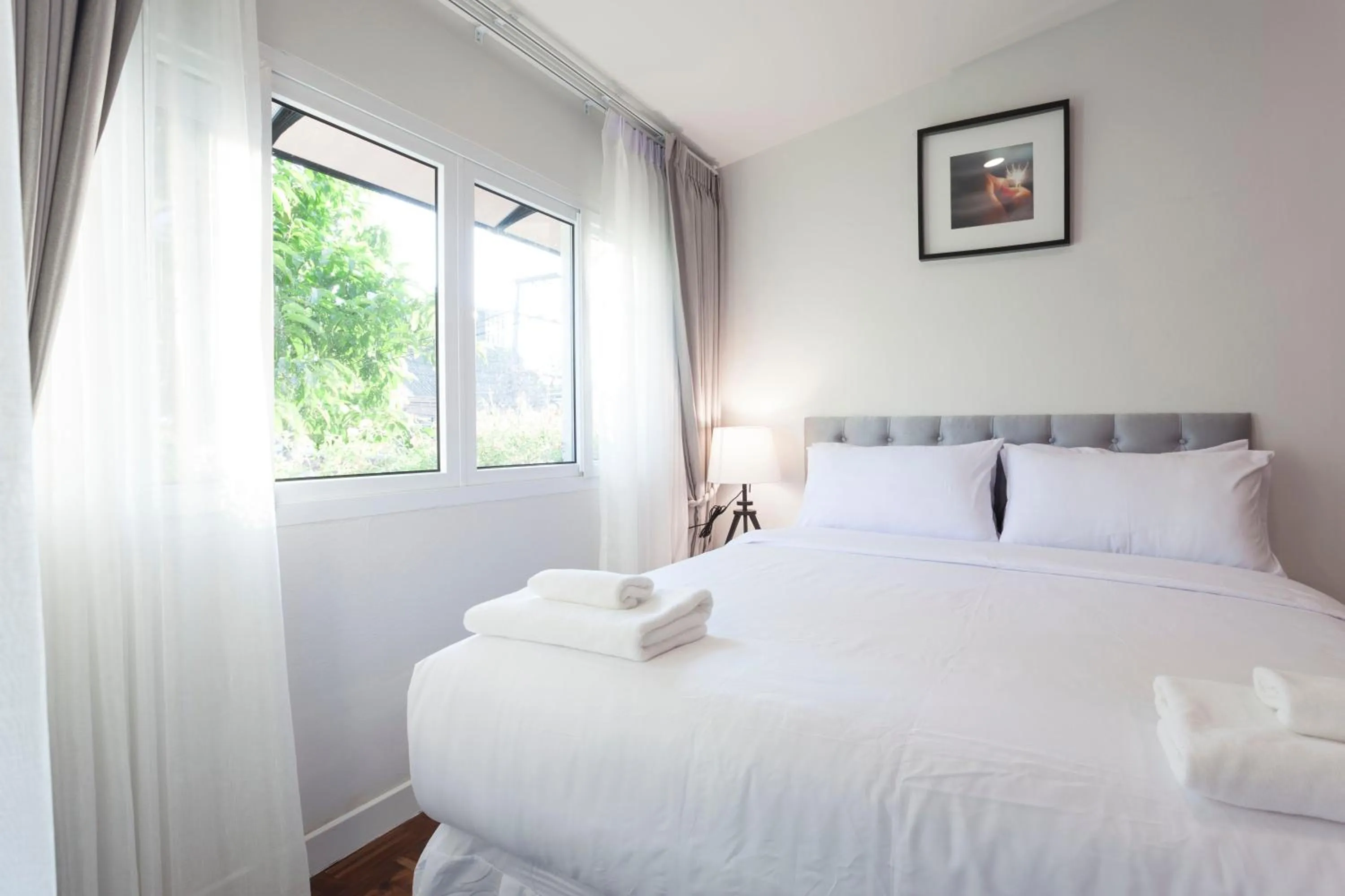 Photo of the whole room, Bed in Cozy Home by Nan