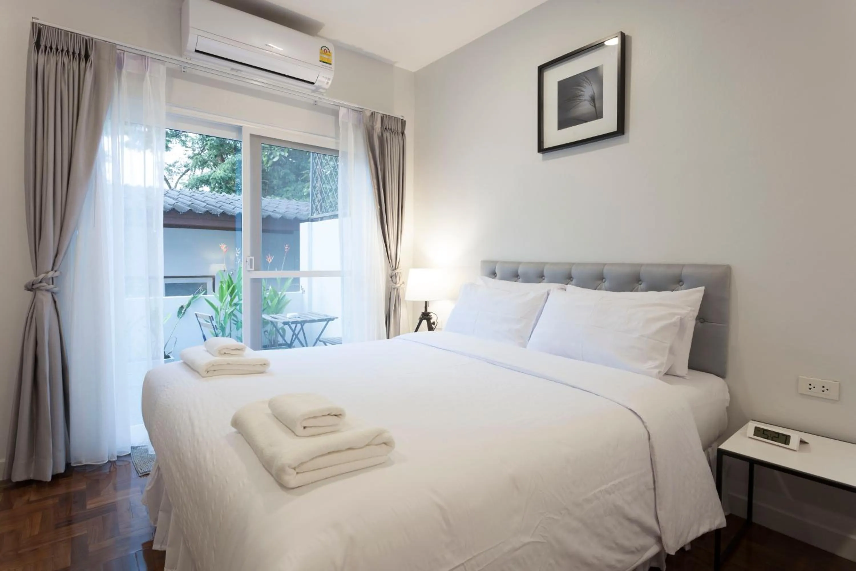 Photo of the whole room, Bed in Cozy Home by Nan