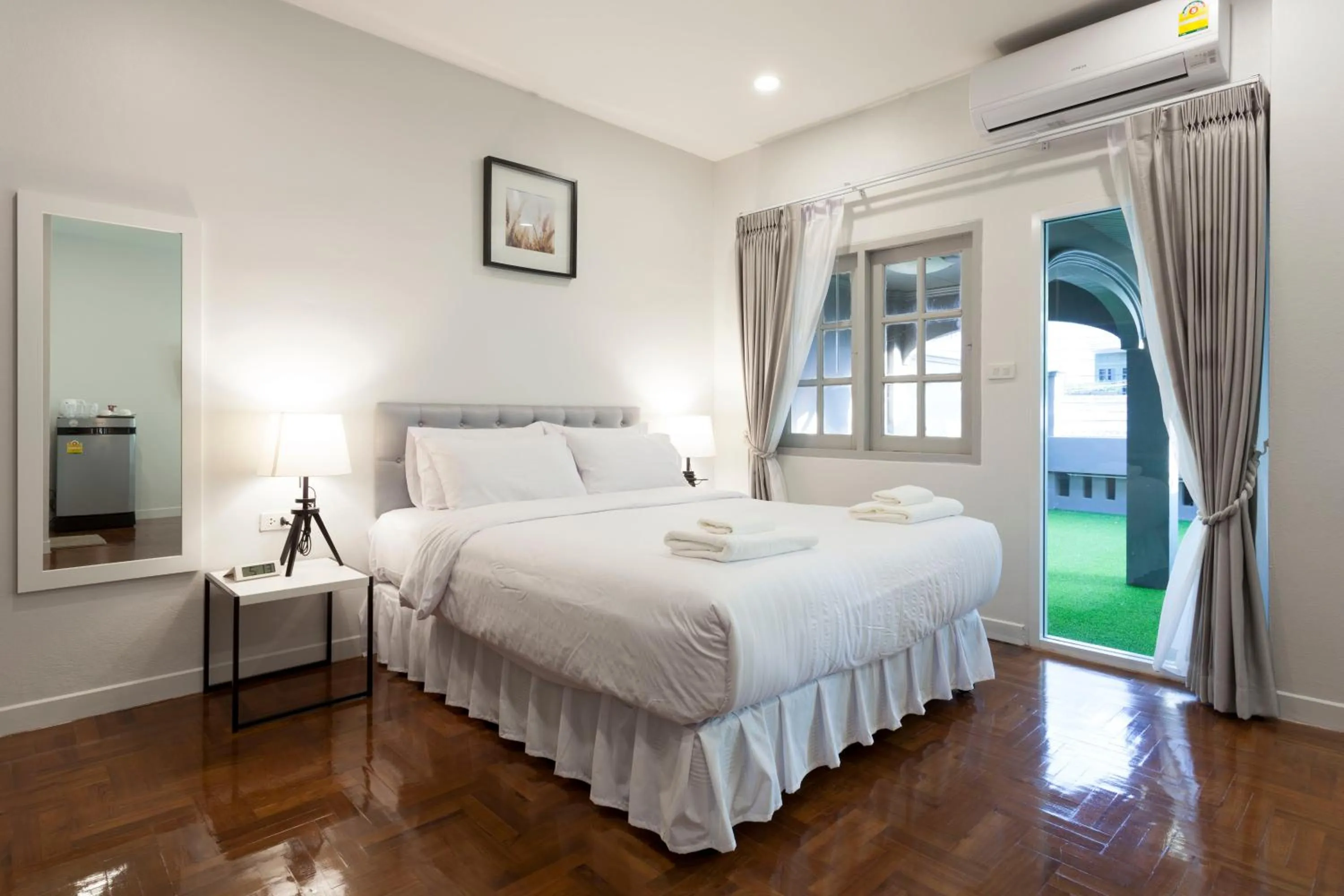 Photo of the whole room, Bed in Cozy Home by Nan