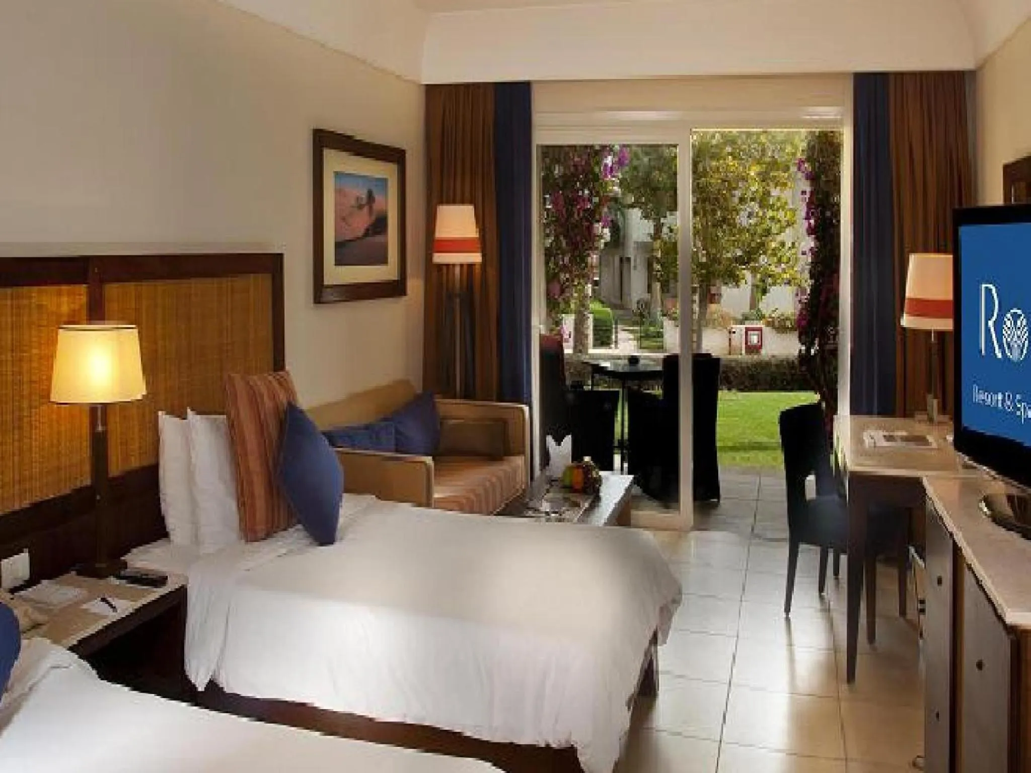 Photo of the whole room, Bed in Grand Rotana Resort & Spa