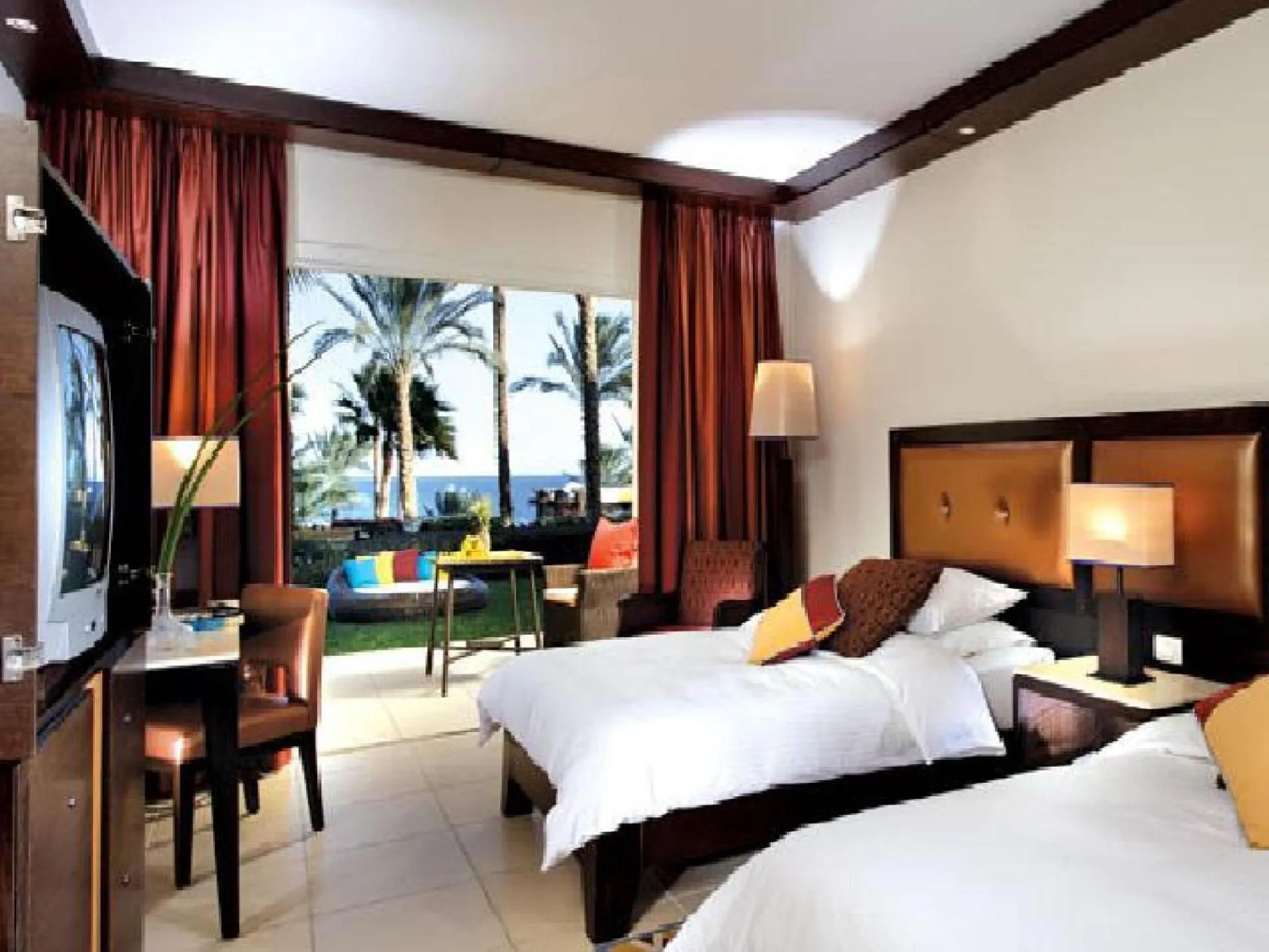Photo of the whole room, Bed in Grand Rotana Resort & Spa