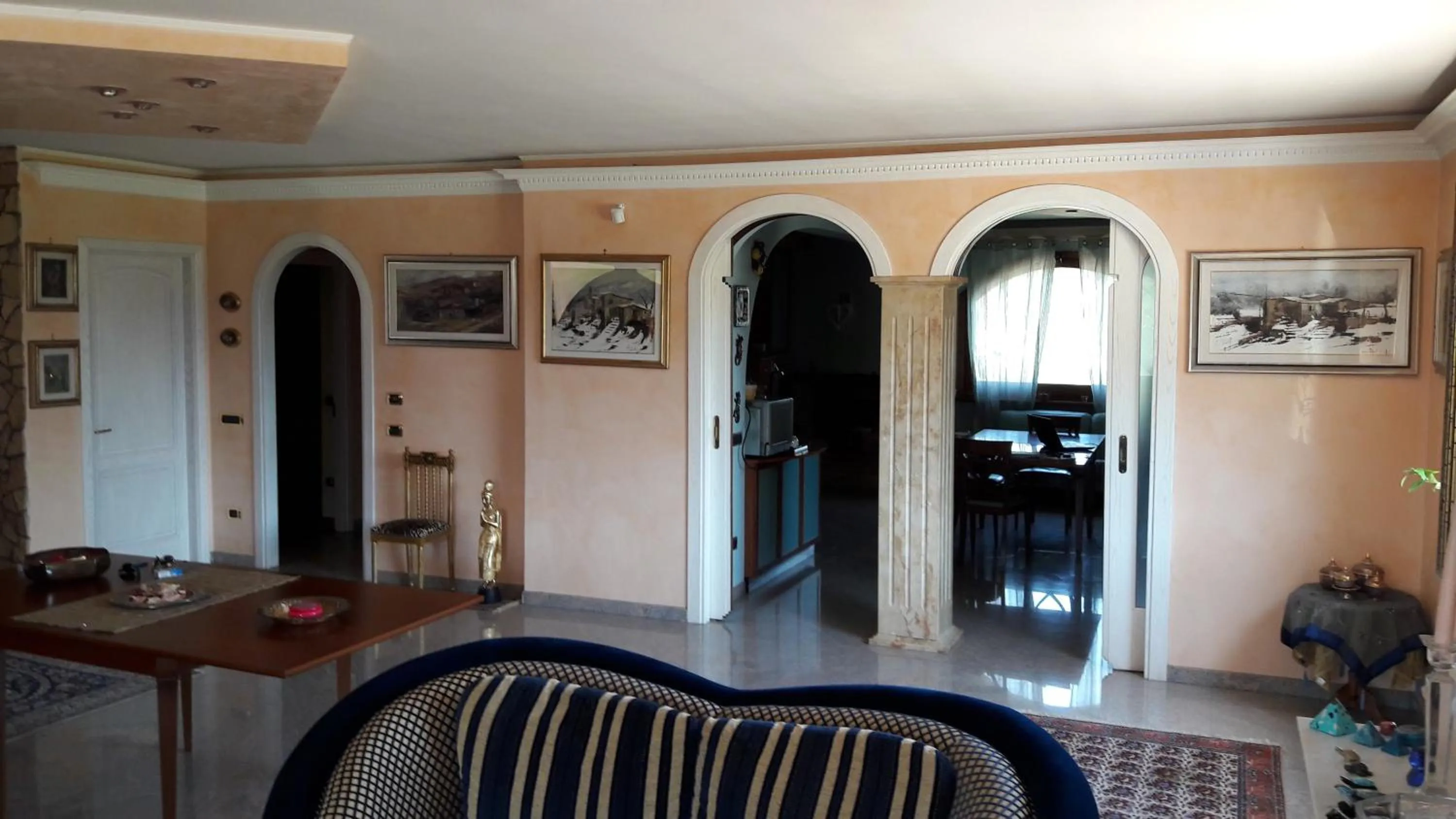 Communal lounge/ TV room in B&B Villa Roberta